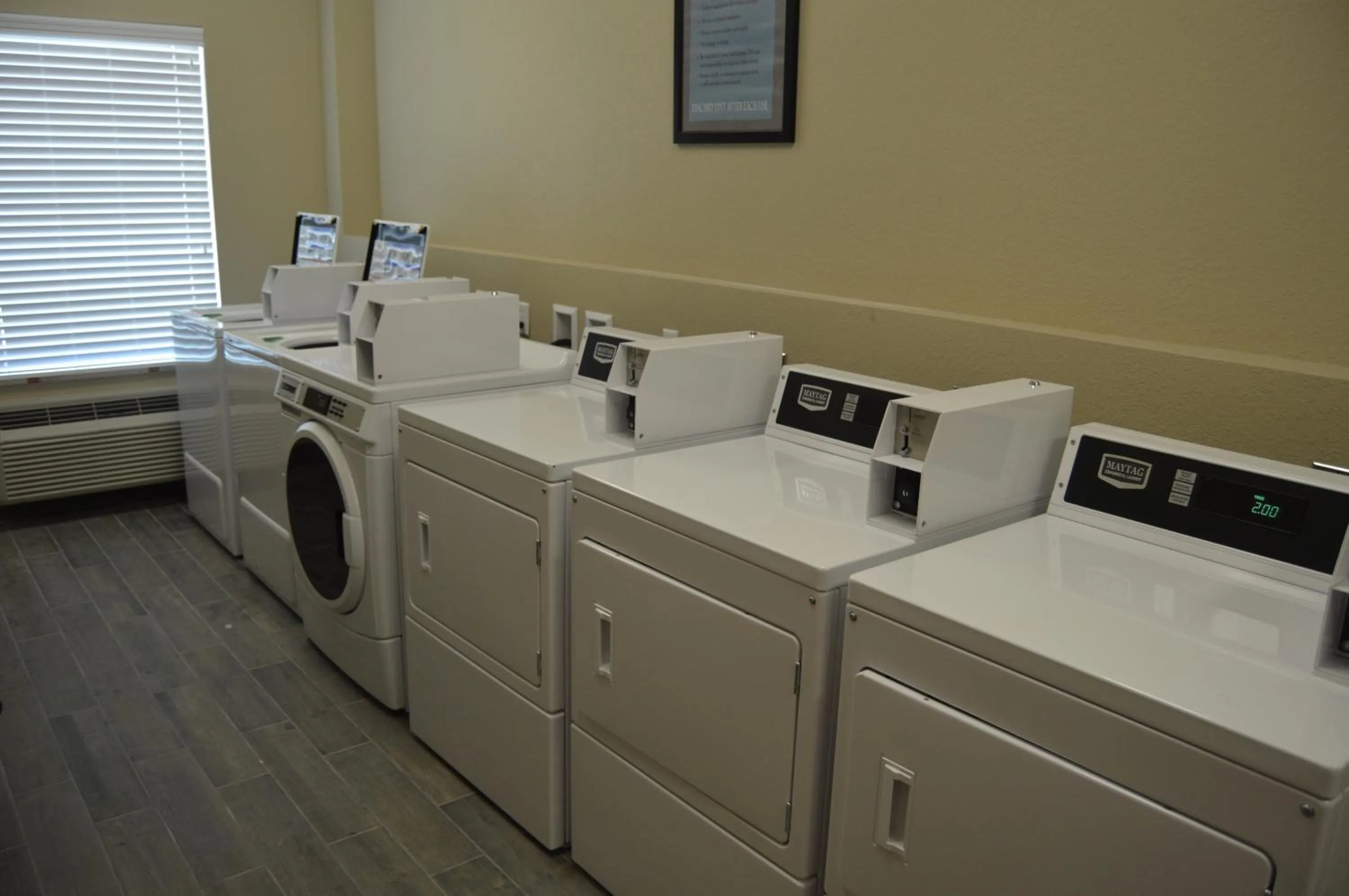 washing machine in Heritage Place Hotel and Suites