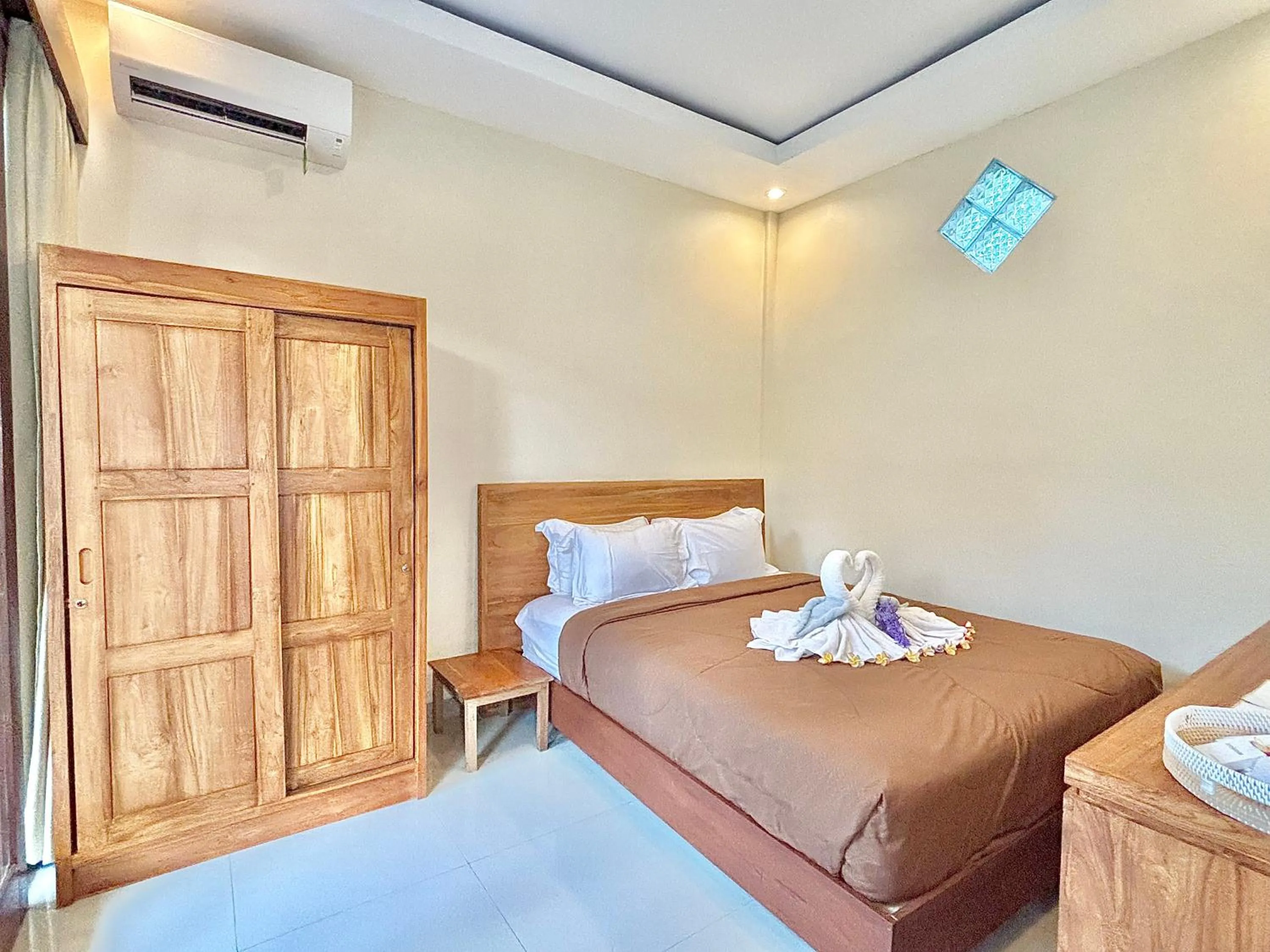 Bed in Kamayu Ubud by Puri Signatures