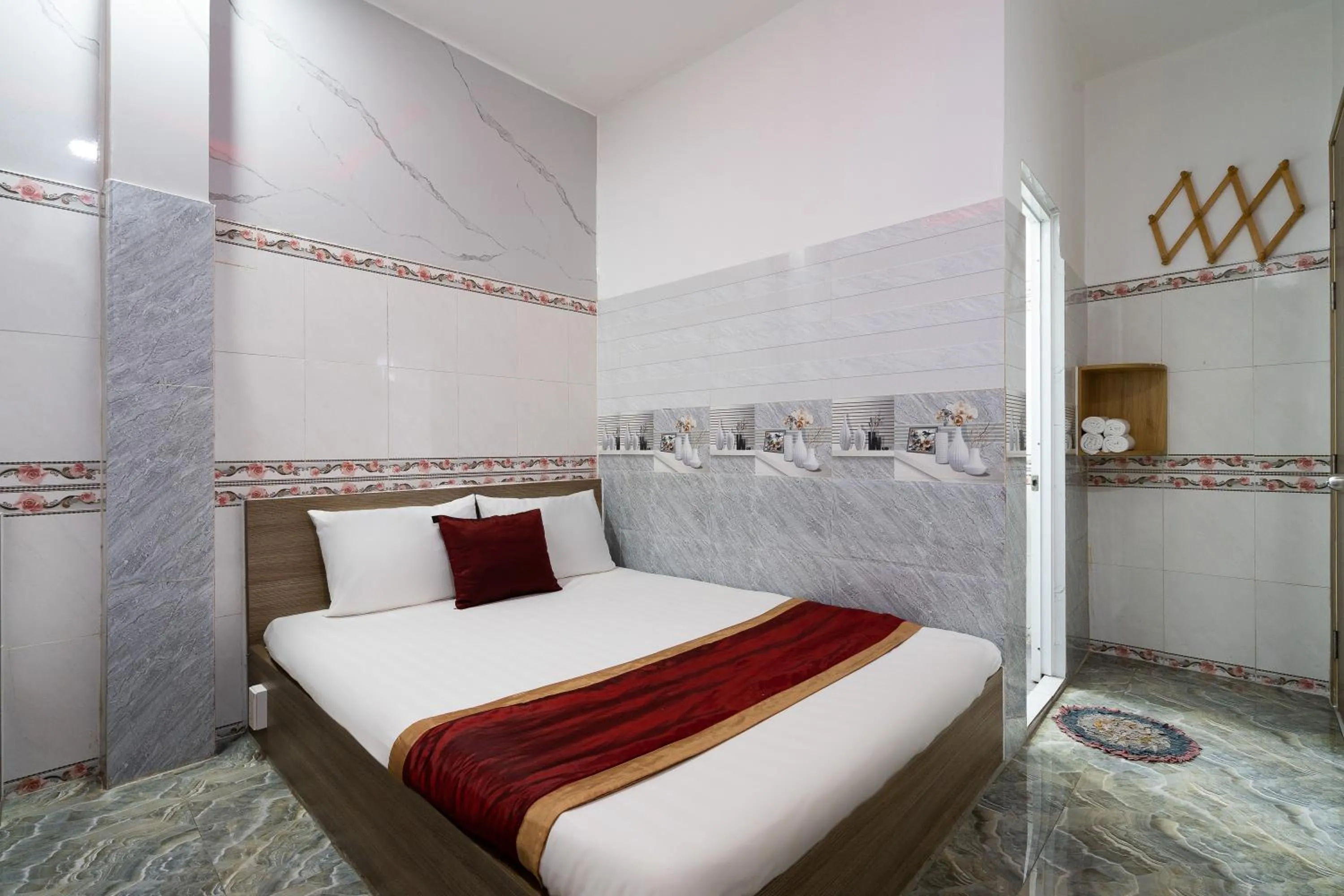 Photo of the whole room, Bed in Collection O District 12 - Mau Tim Hotel