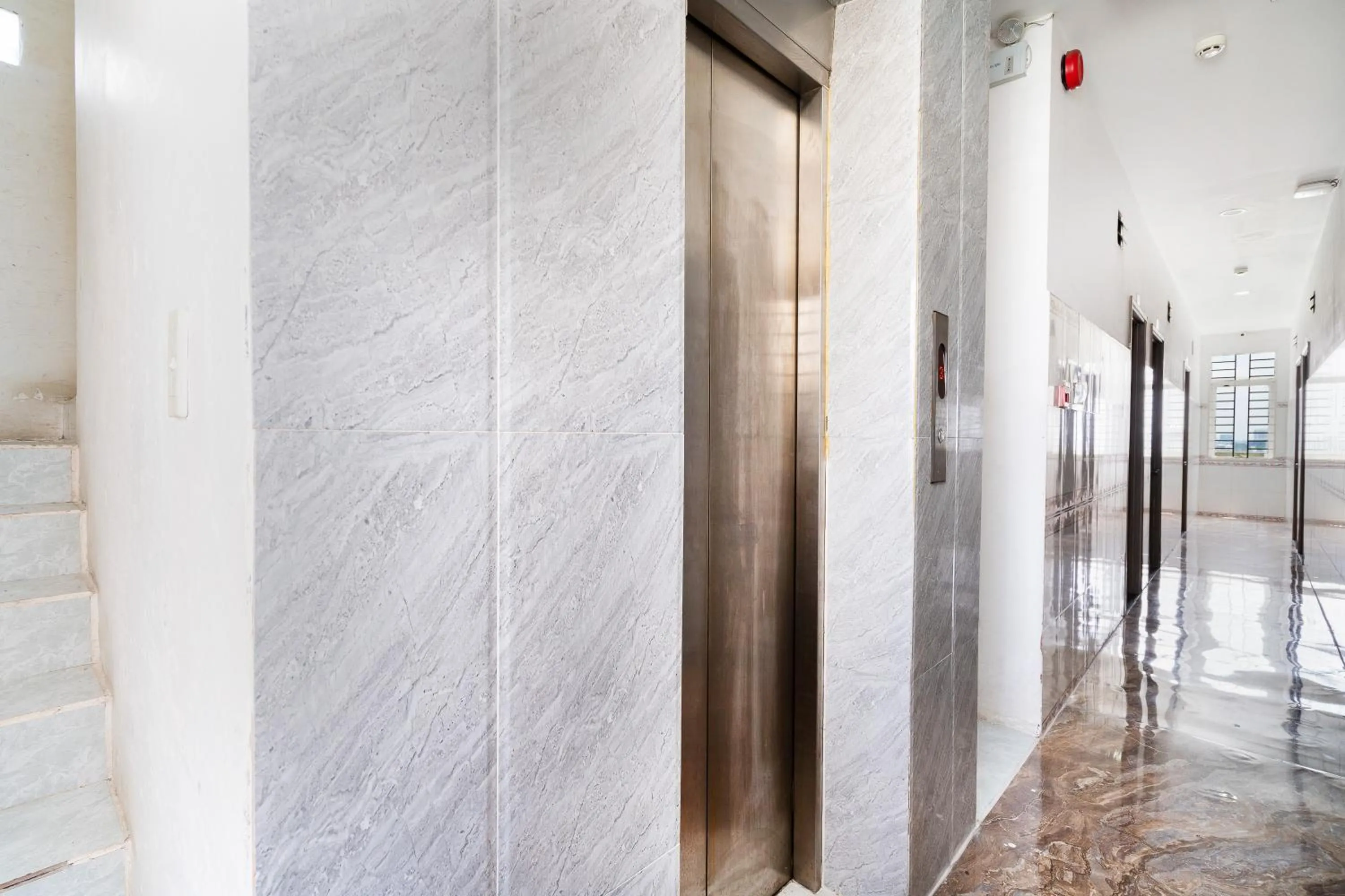 elevator in Collection O District 12 - Mau Tim Hotel