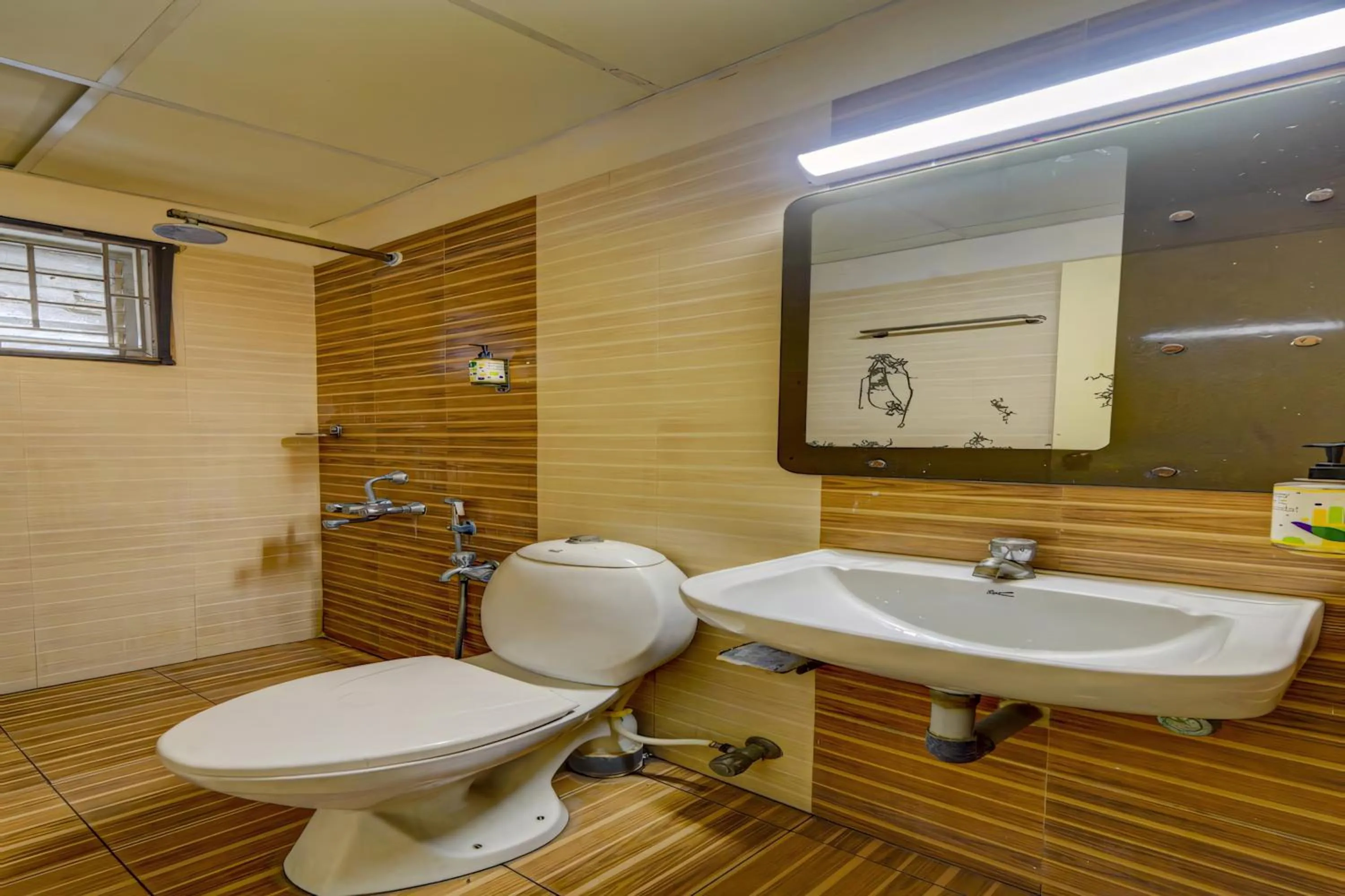 Shower in RG SUITES Ashok Nagar Near VADAPALANI