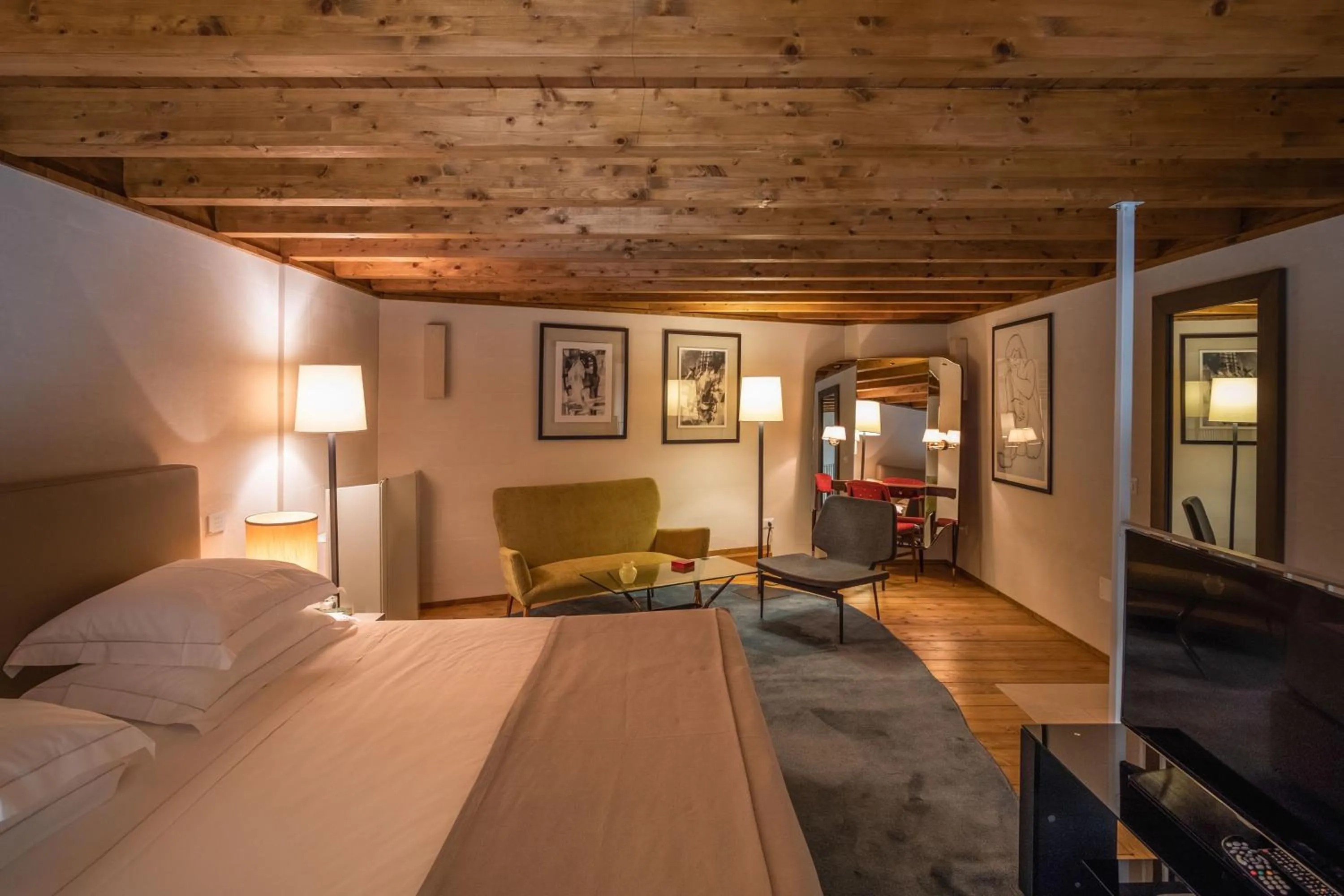 Bed in La Fiermontina Luxury Home Hotel