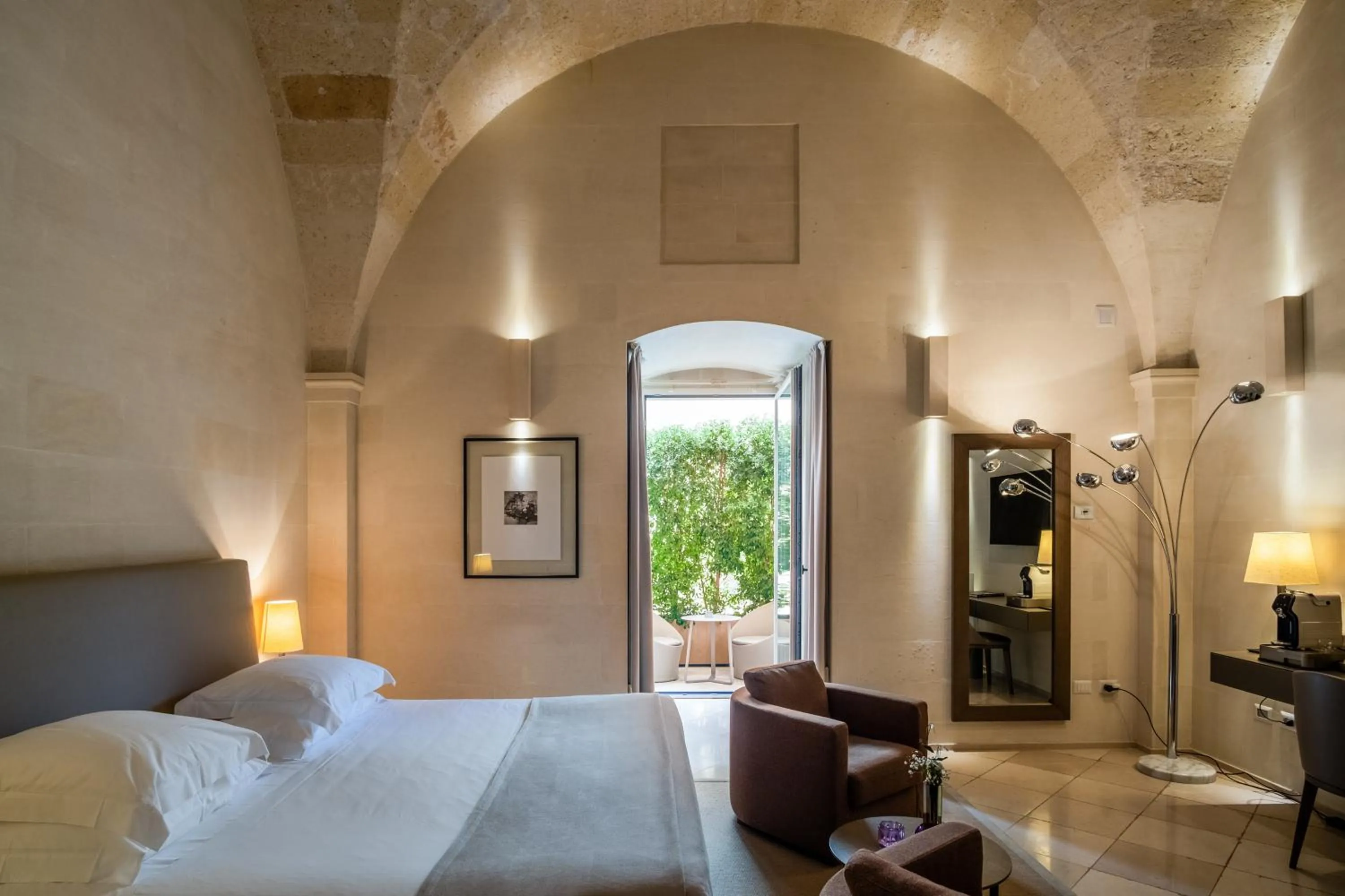 Bed in La Fiermontina Luxury Home Hotel