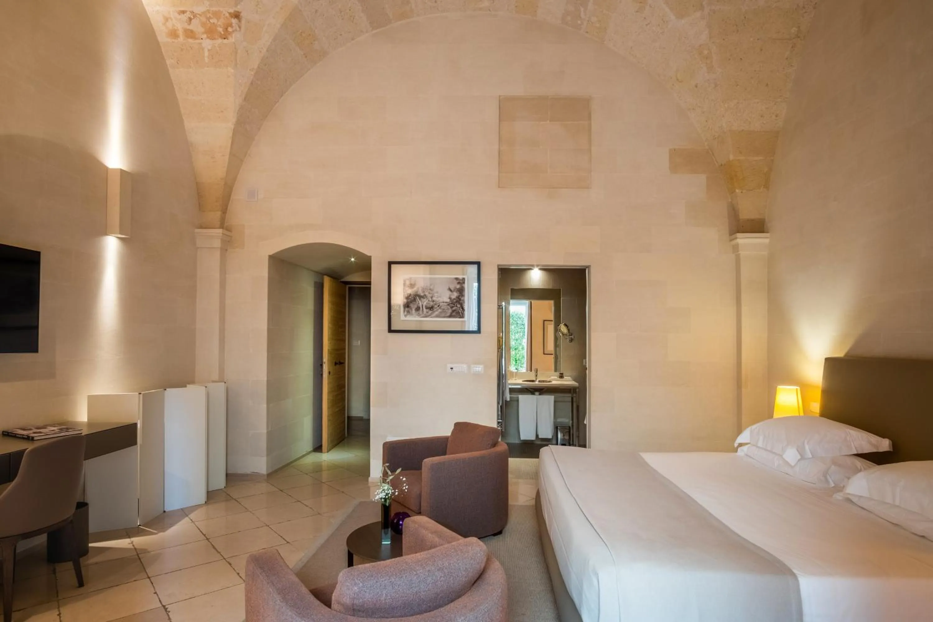 Bed in La Fiermontina Luxury Home Hotel