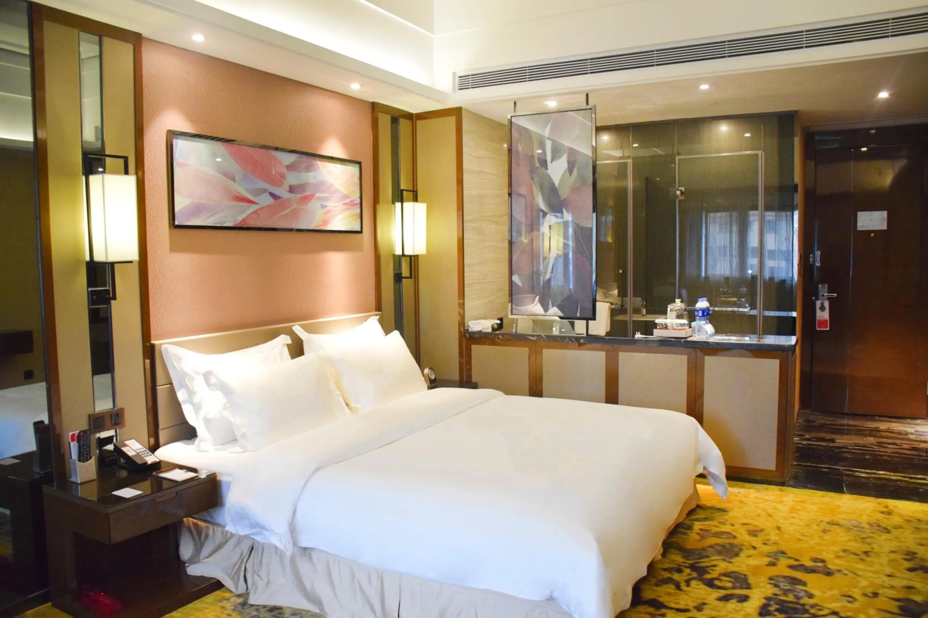 Bed in Ramada Foshan Hotel