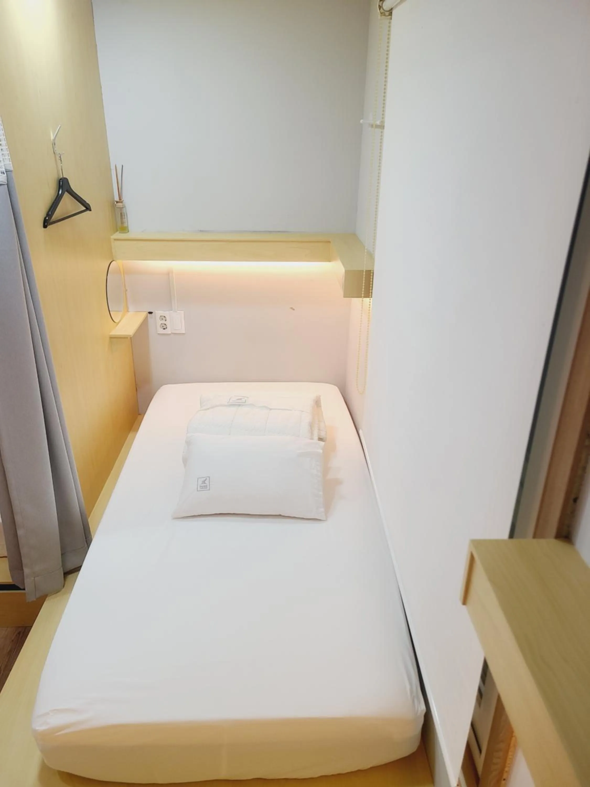 Bed in Elephant Hostel Nampo