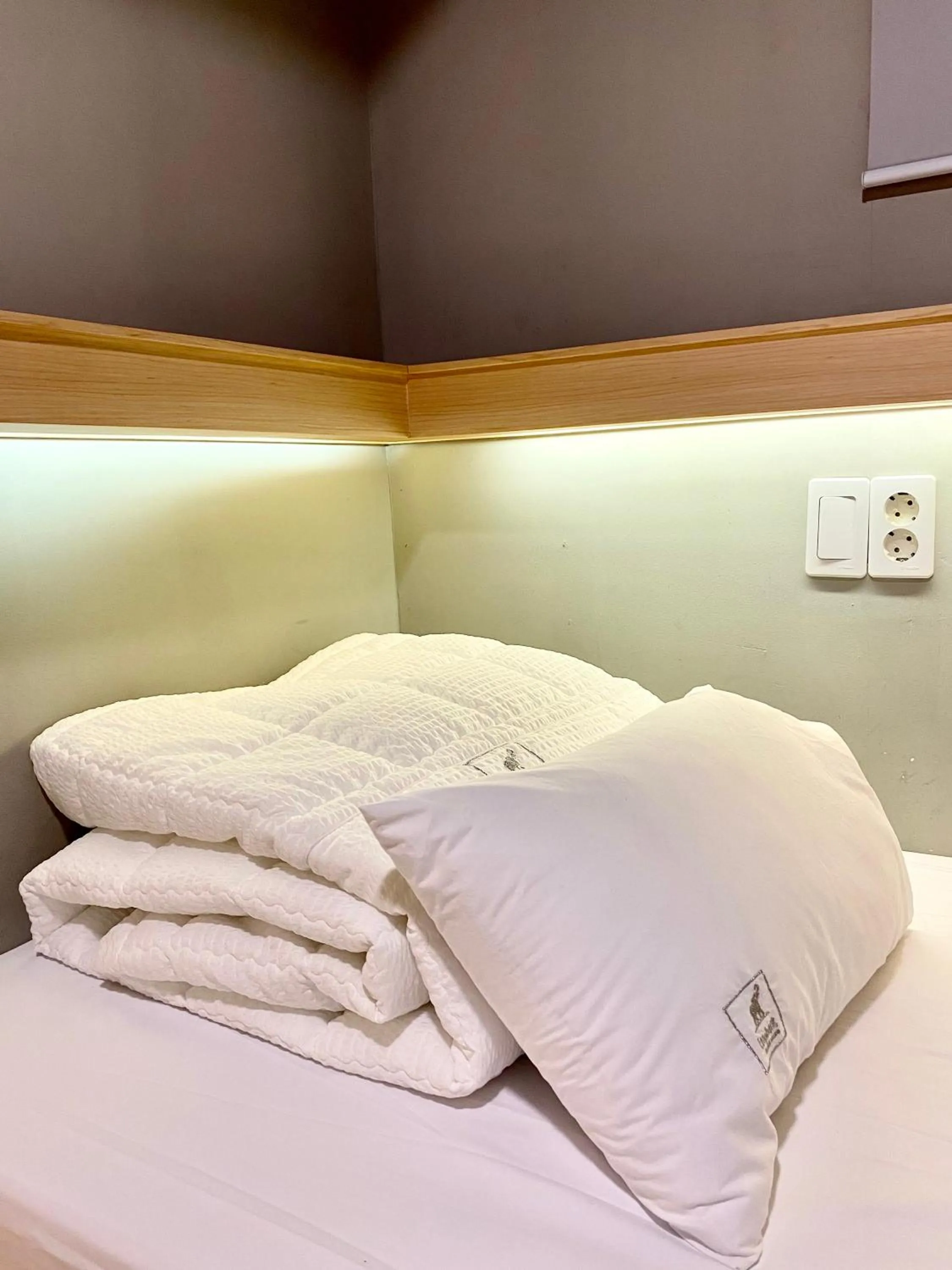 Bed in Elephant Hostel Nampo