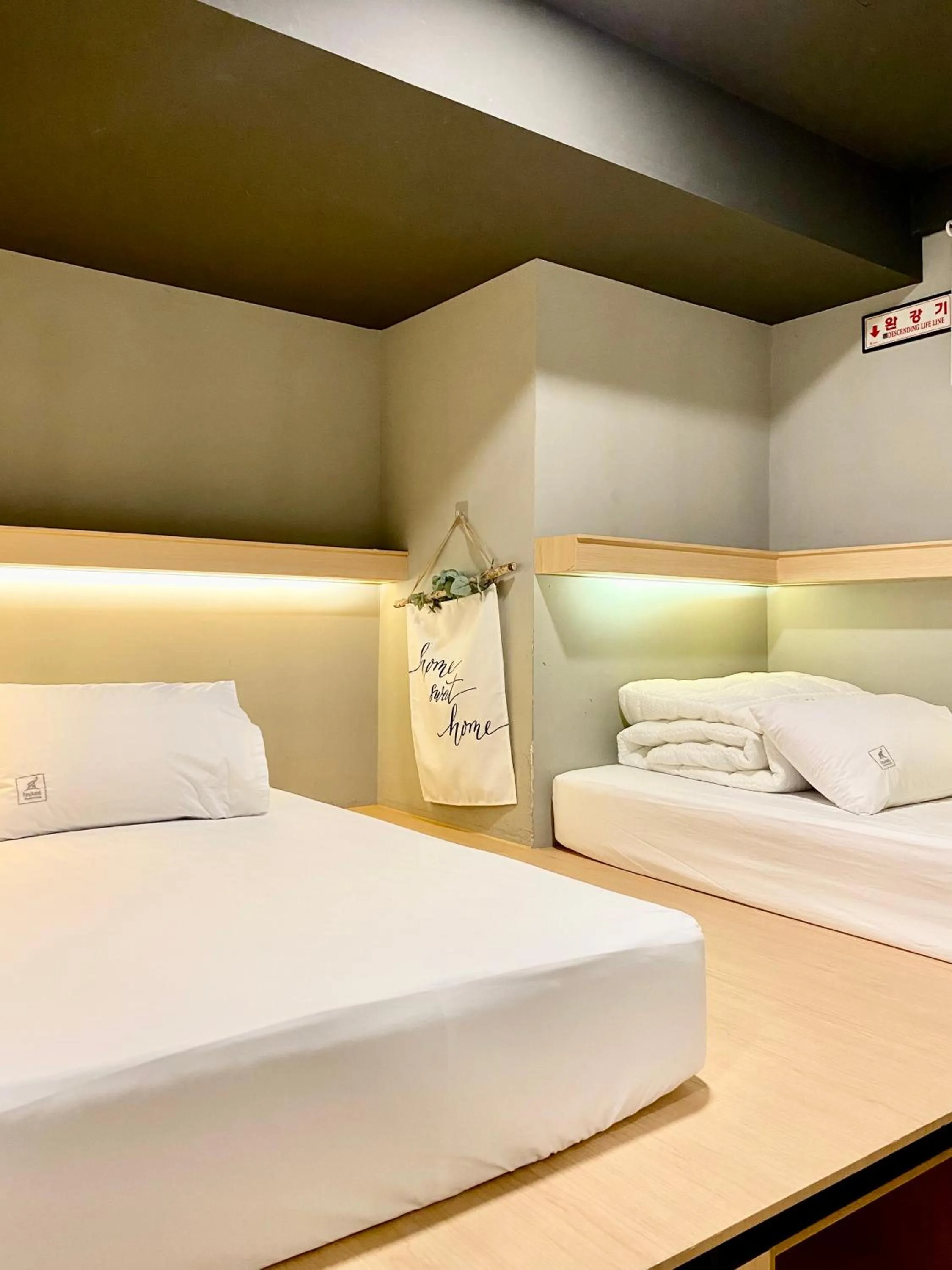 Bed in Elephant Hostel Nampo