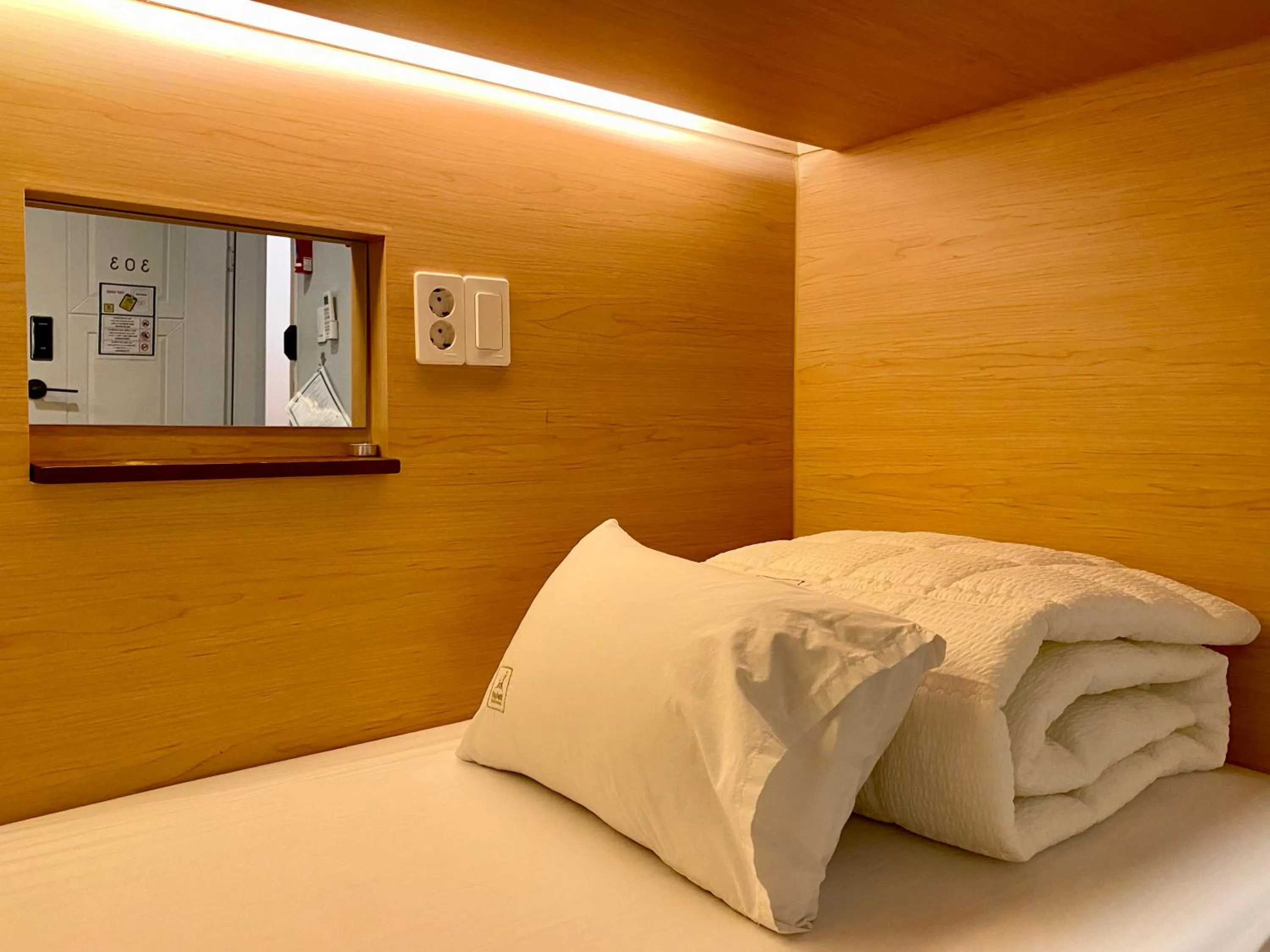 Bed in Elephant Hostel Nampo