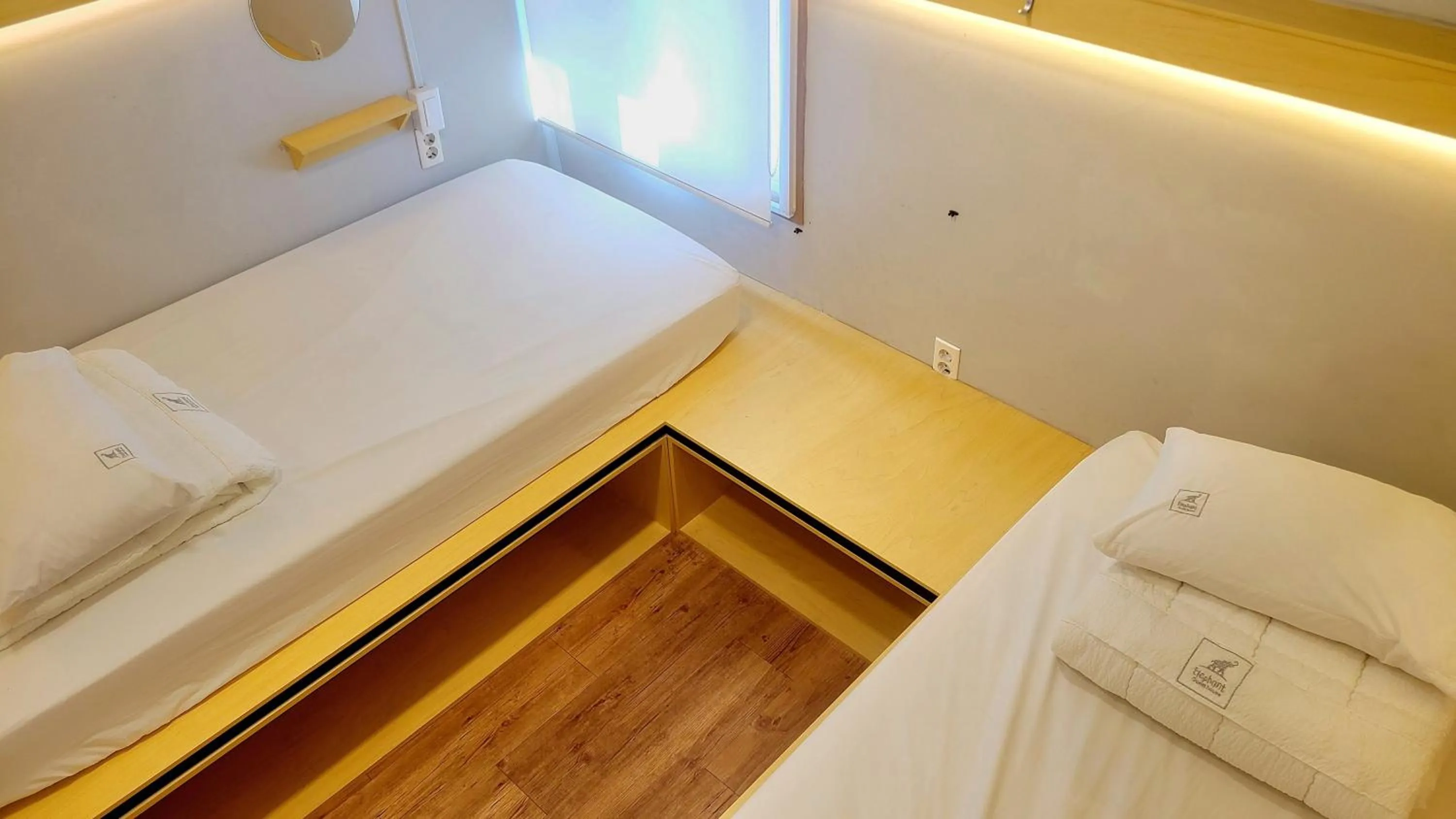 Bed in Elephant Hostel Nampo