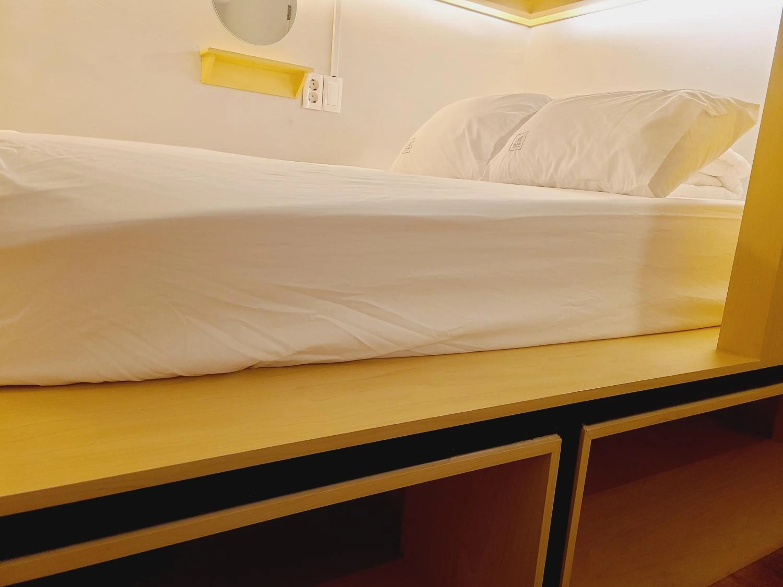 Bed in Elephant Hostel Nampo