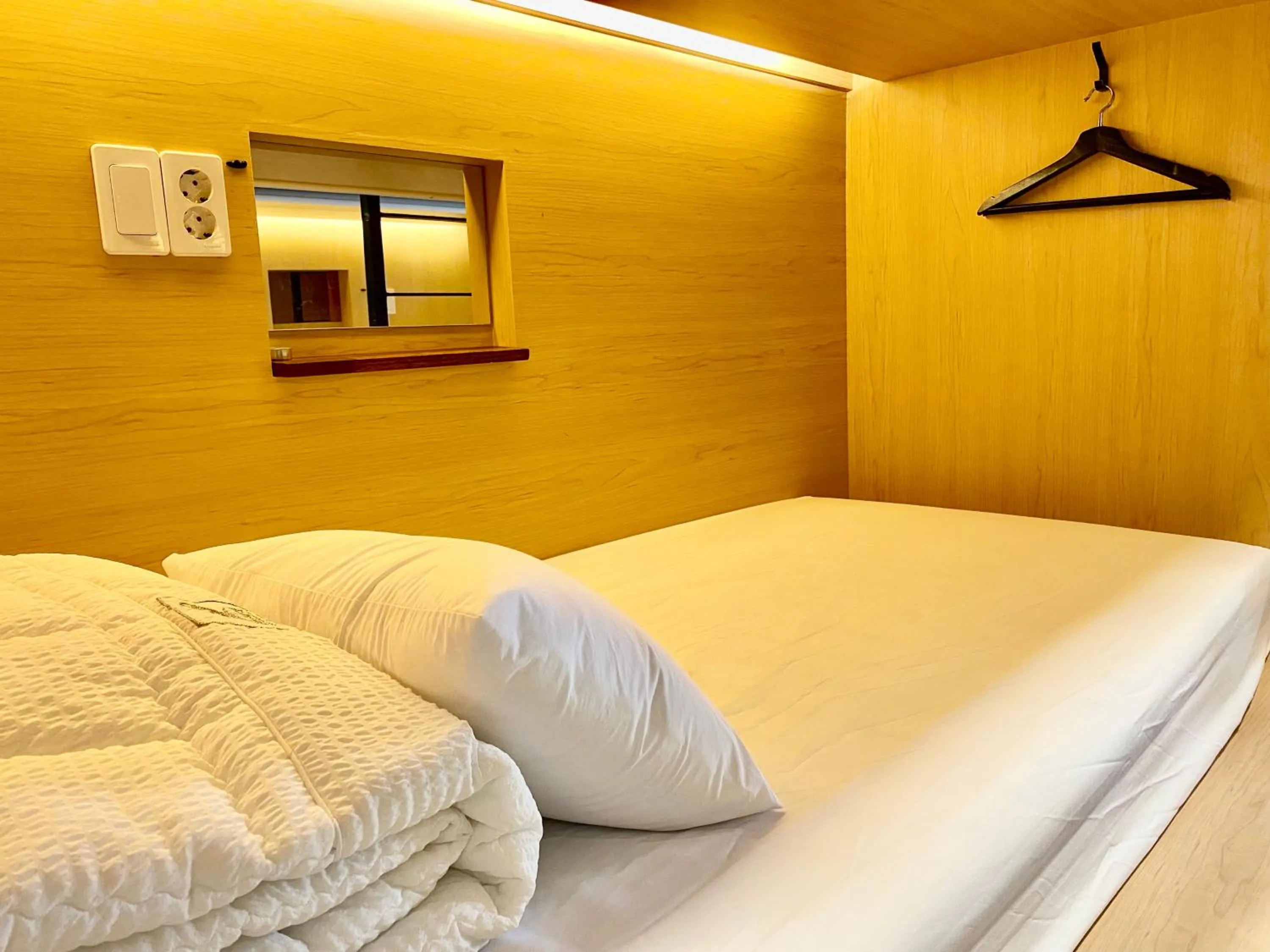 Bed in Elephant Hostel Nampo