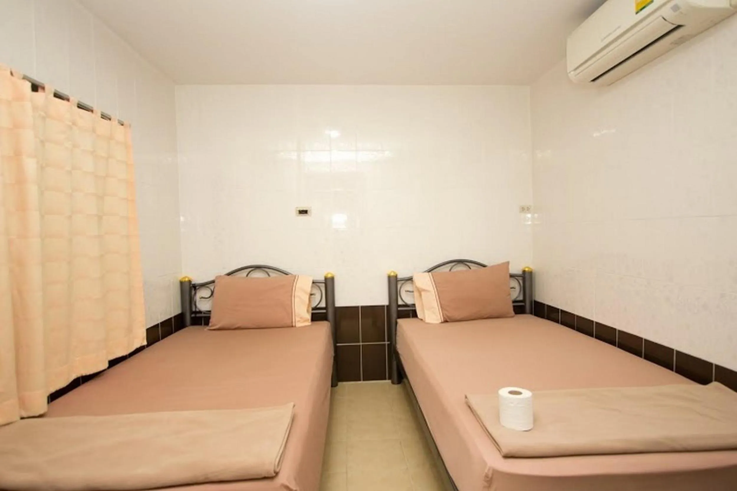 Photo of the whole room, Bed in At Home Guest House