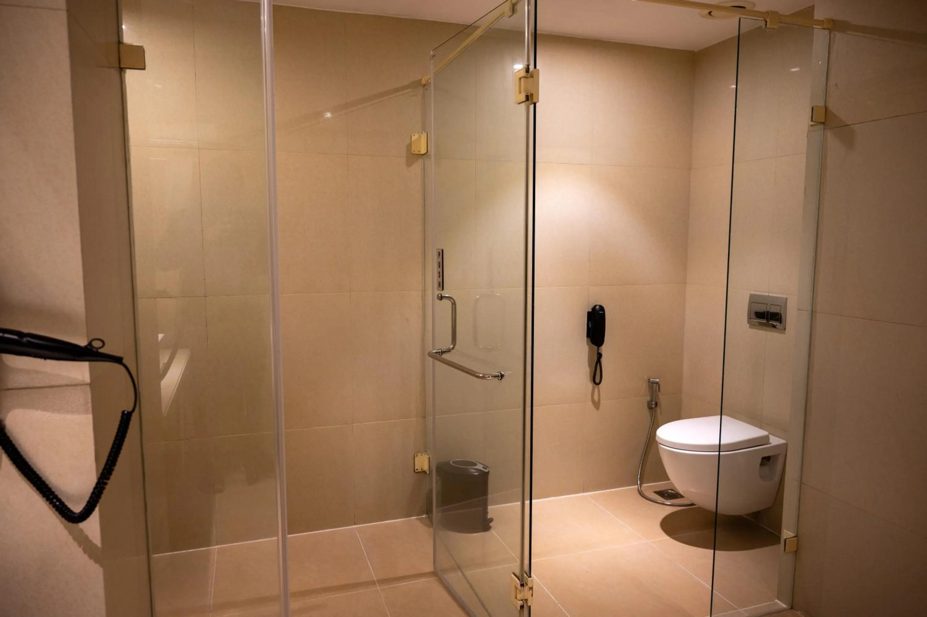 Bathroom in Grand Kakinada by GRT Hotels