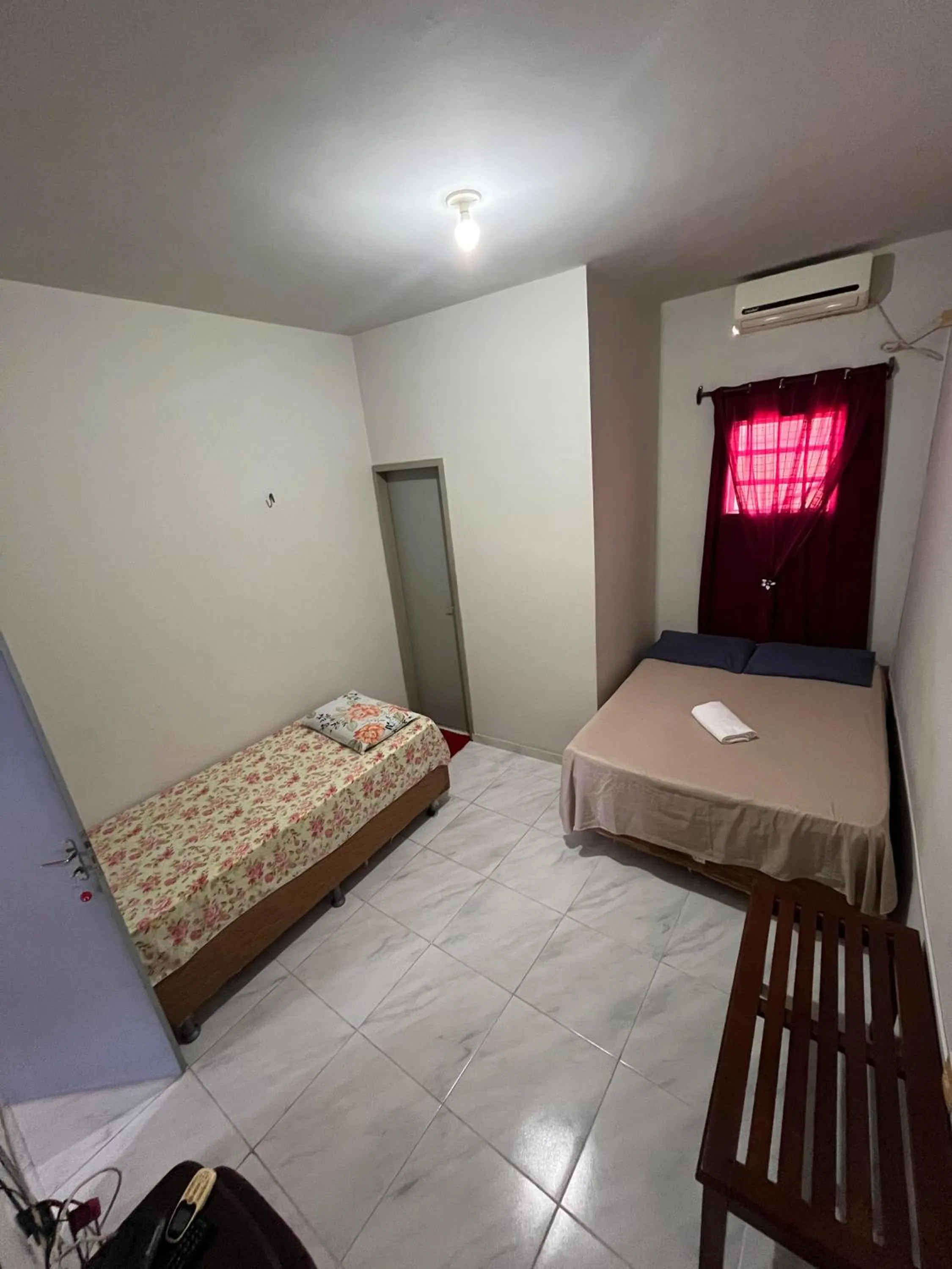 Bed in Pousada santos