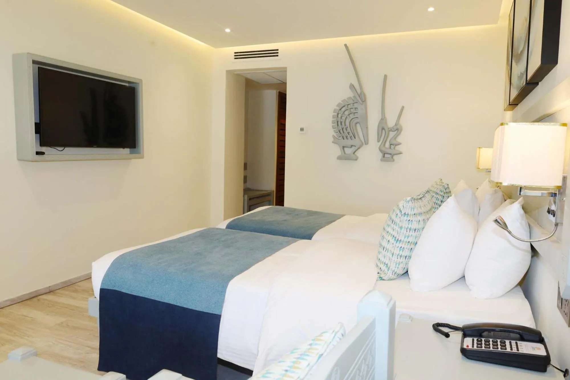 TV and multimedia, Bed in Baobab Beach Resort & Spa