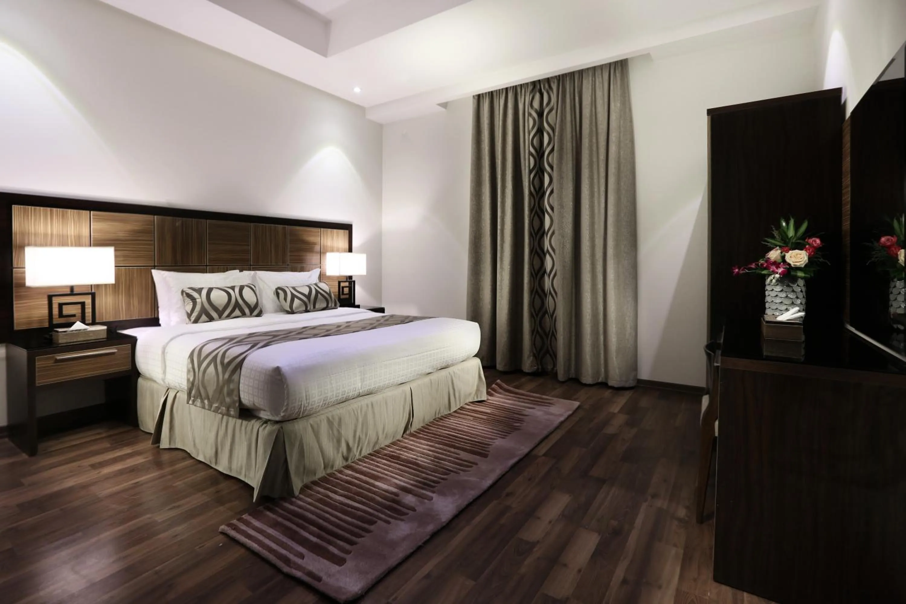 Bed in Duset Hotel Suites