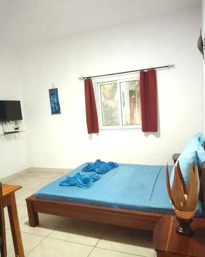 Bed in Tropic Hôtel