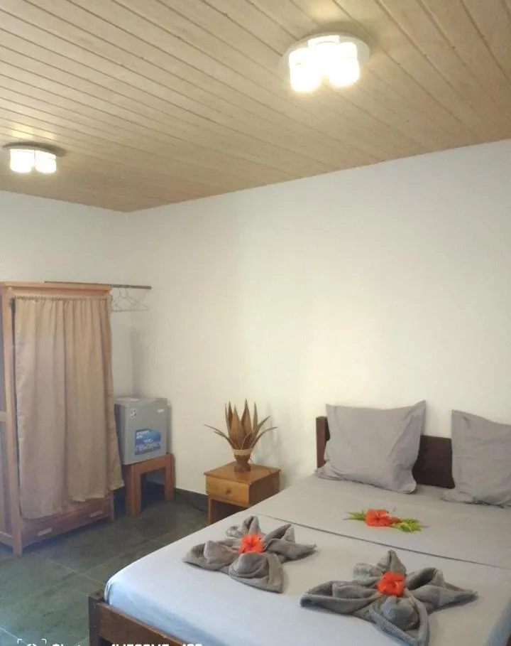 Bed in Tropic Hôtel