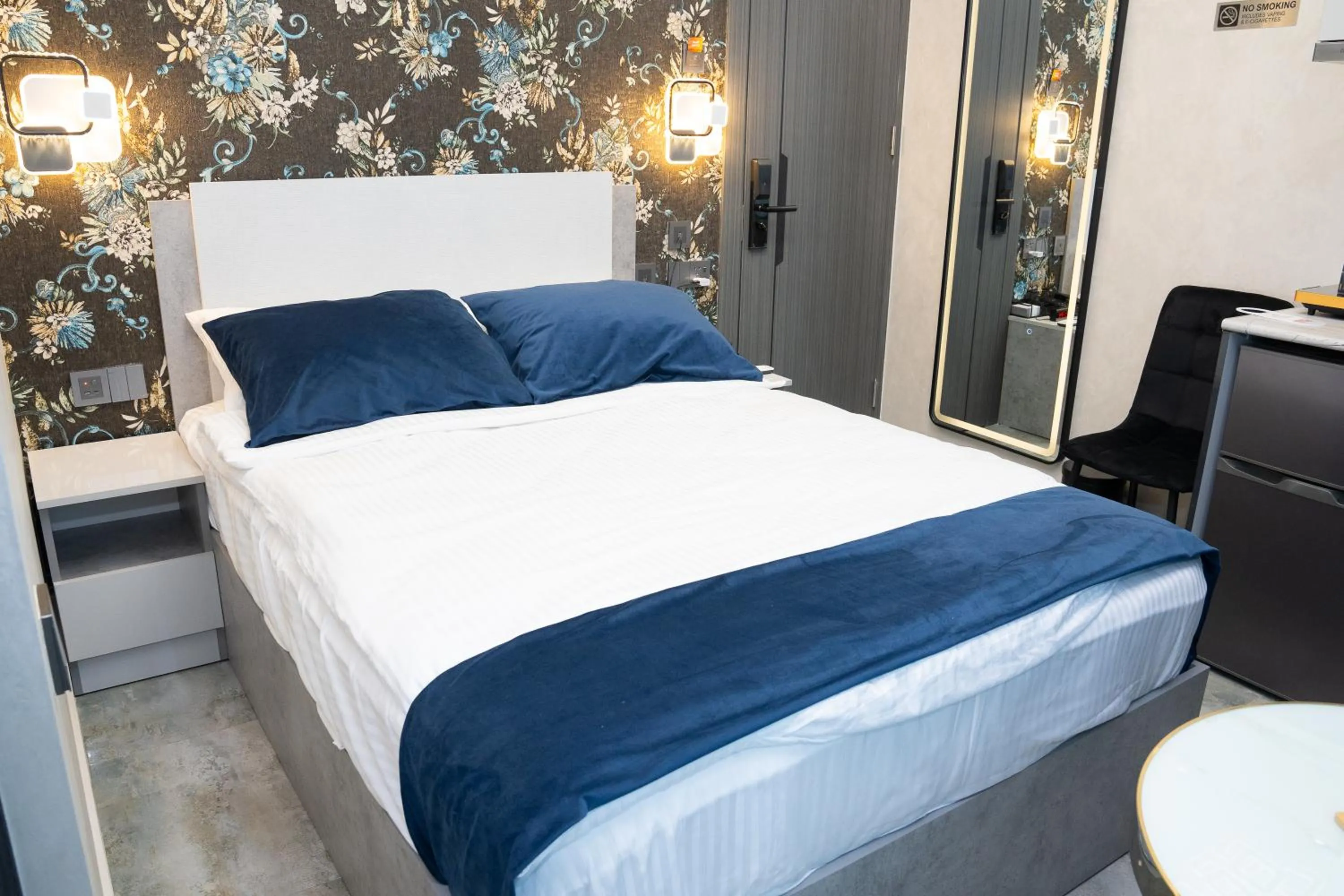 Photo of the whole room, Bed in Prime Suites Hotel