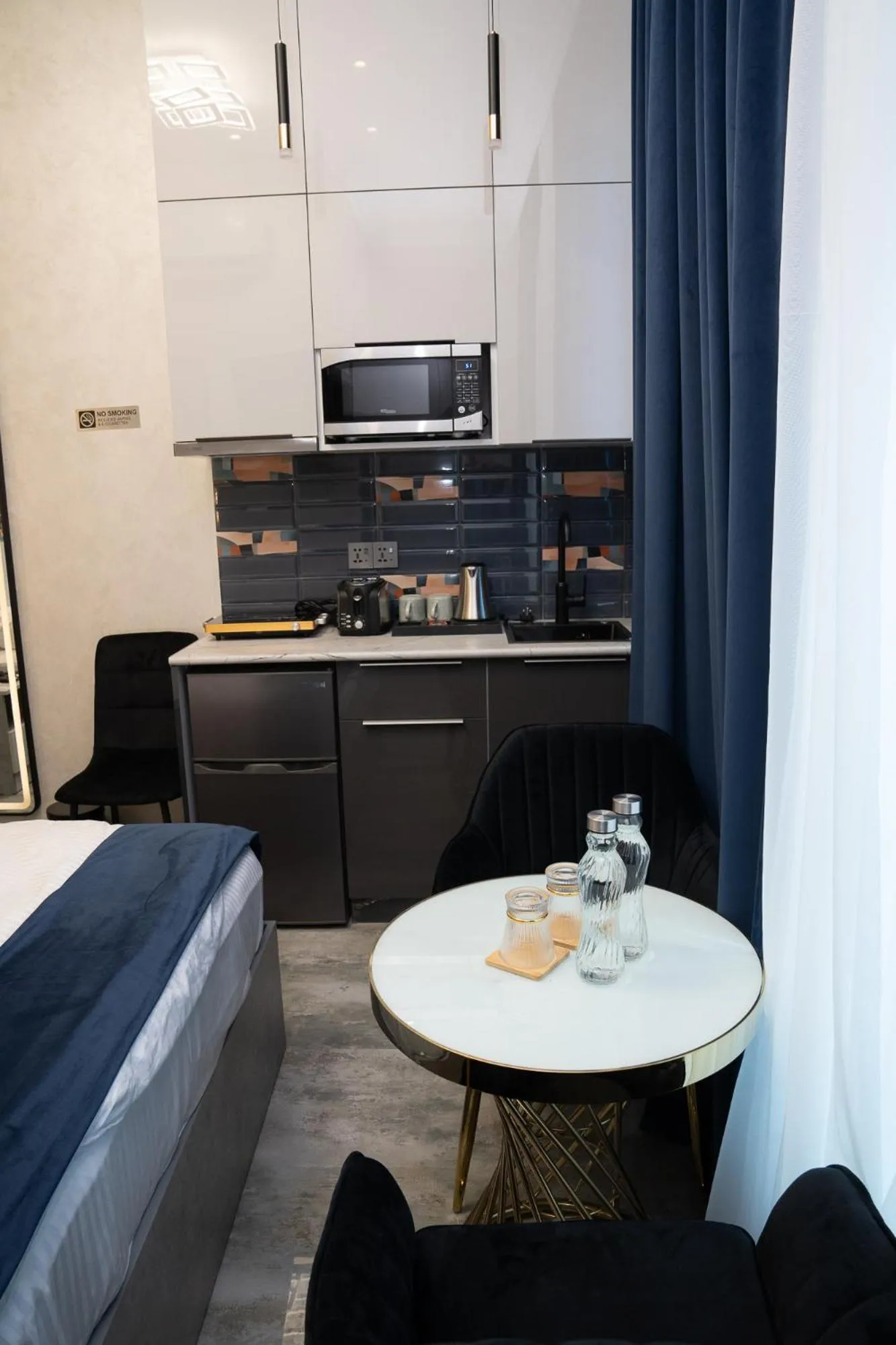 Kitchen or kitchenette in Prime Suites Hotel