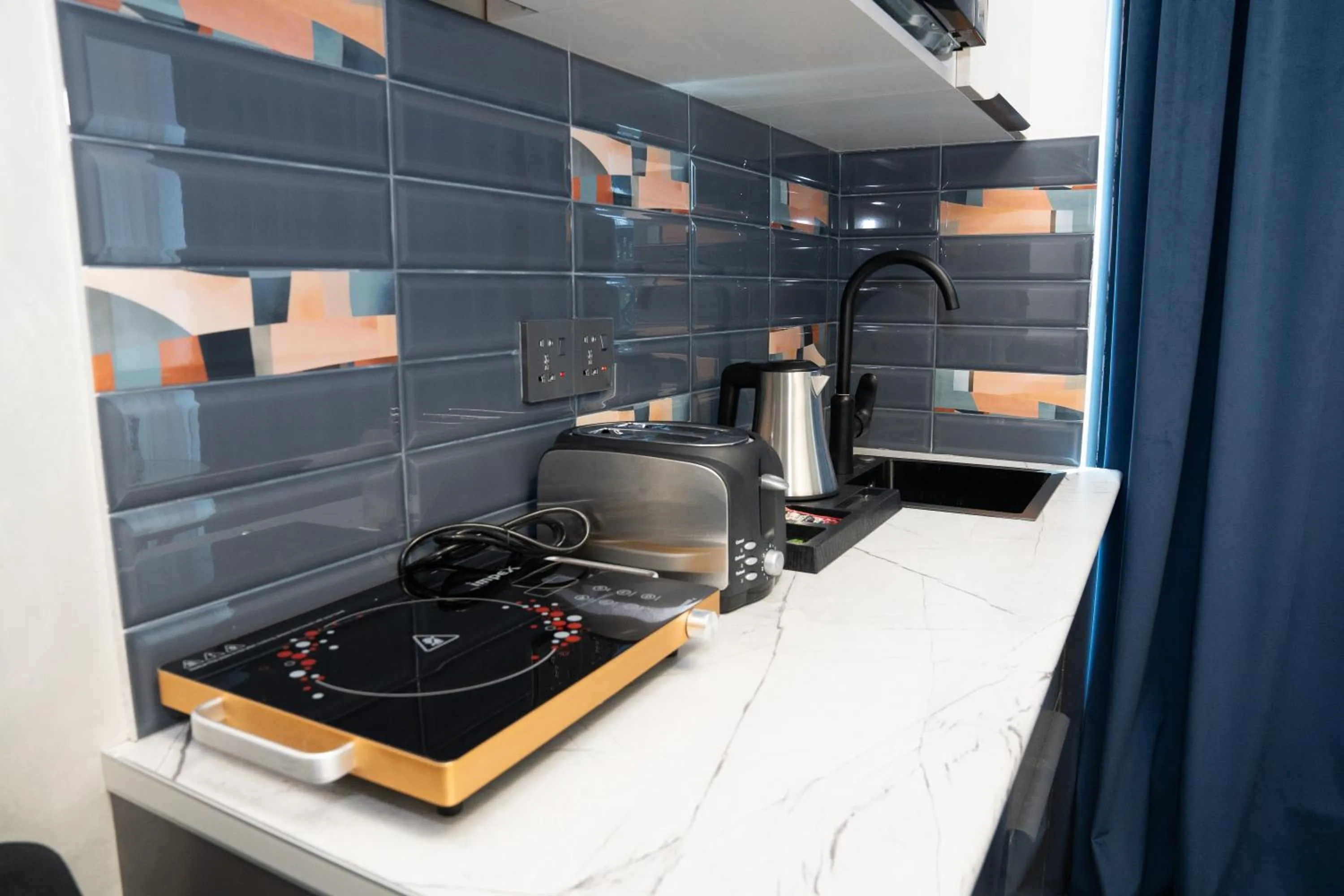 Kitchen or kitchenette in Prime Suites Hotel