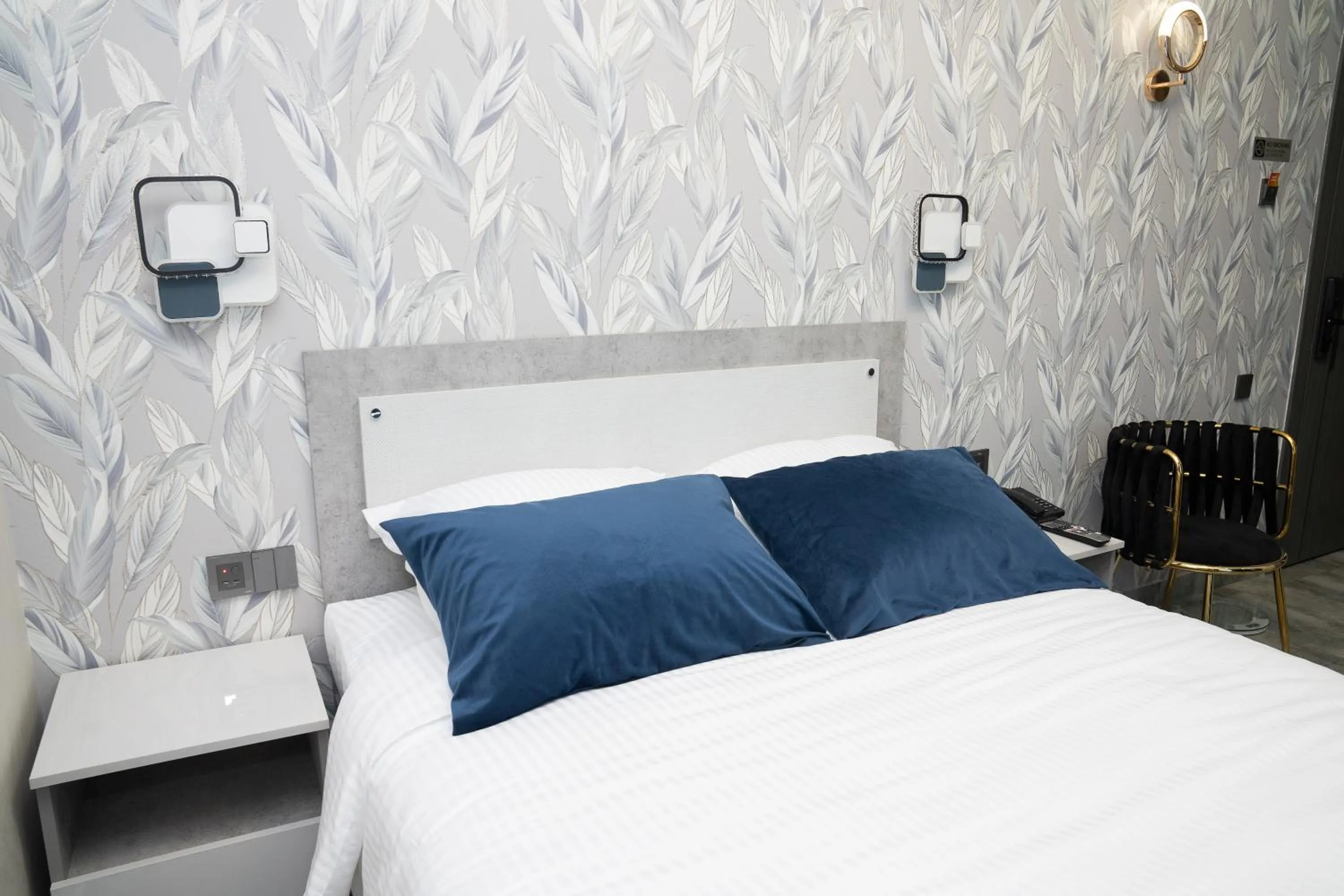 Bed in Prime Suites Hotel