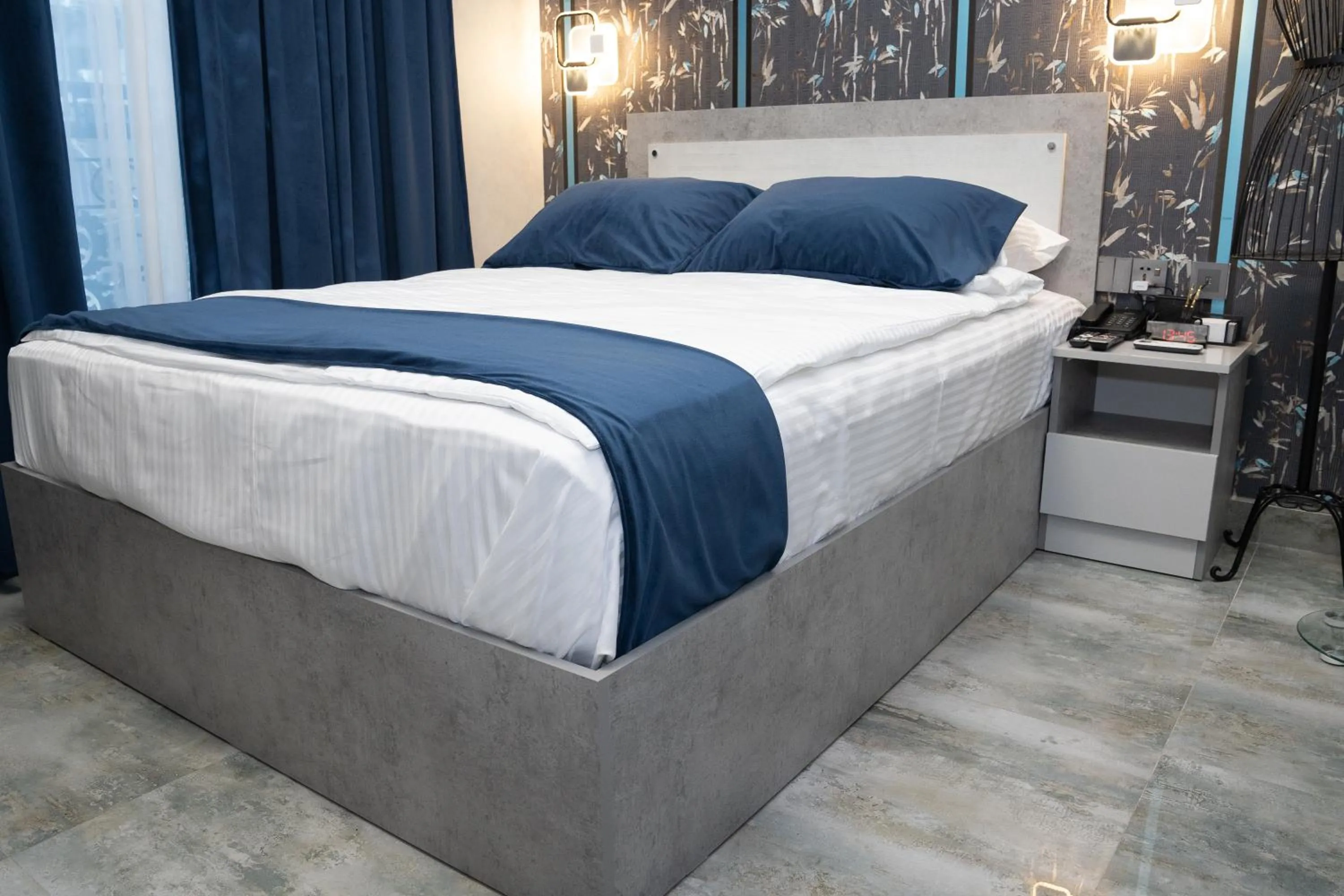 Bed in Prime Suites Hotel