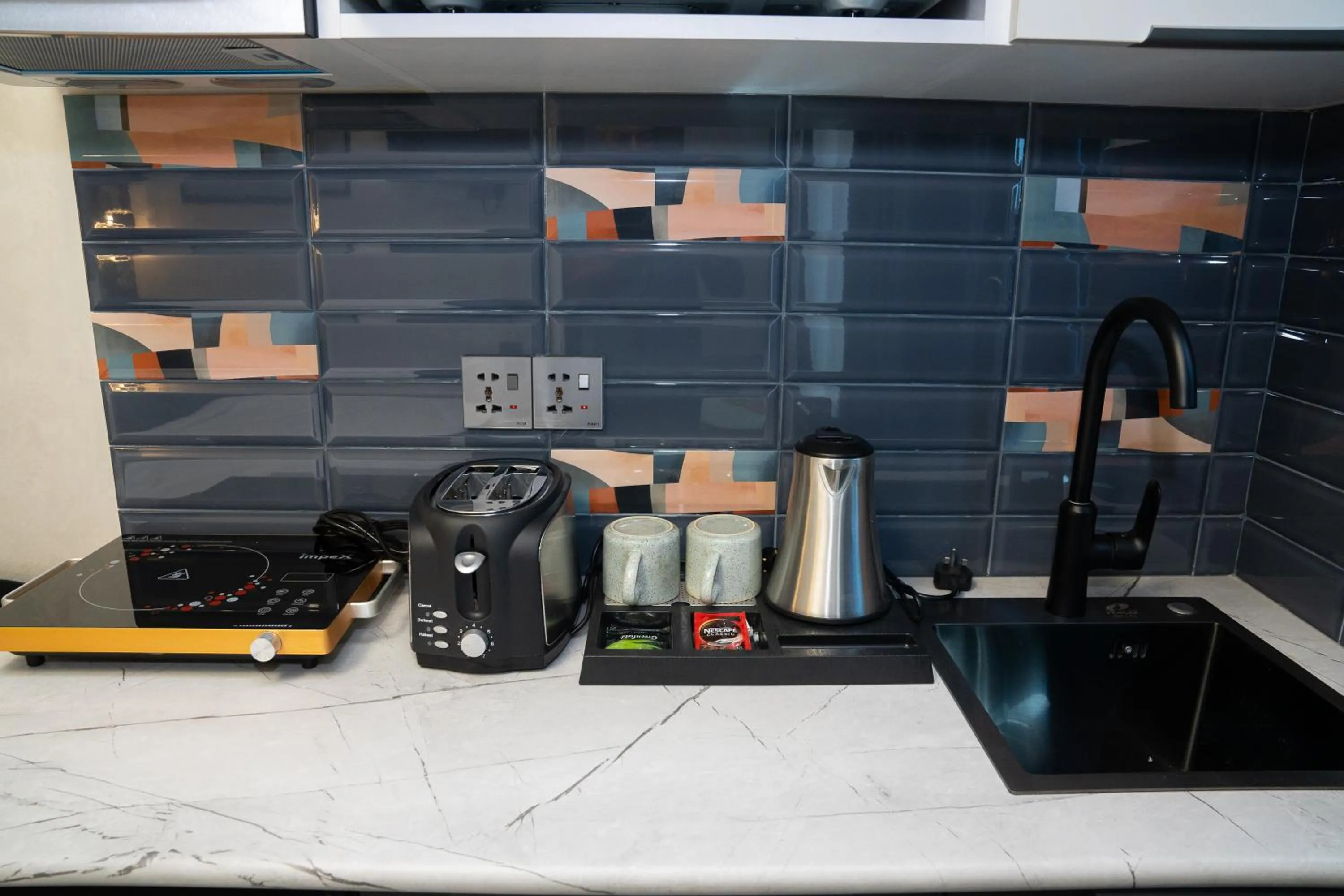 Coffee/tea facilities in Prime Suites Hotel