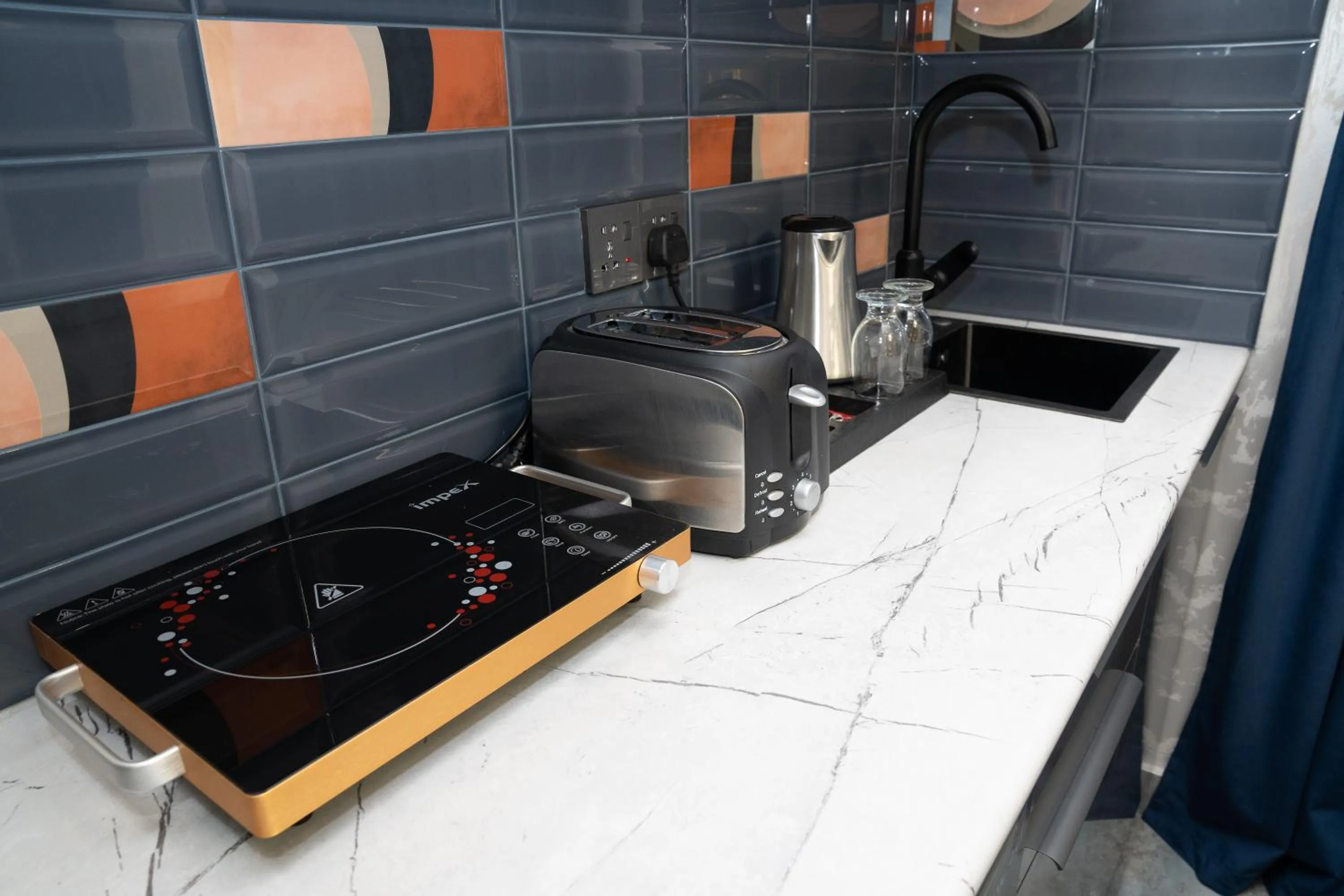 Coffee/tea facilities in Prime Suites Hotel