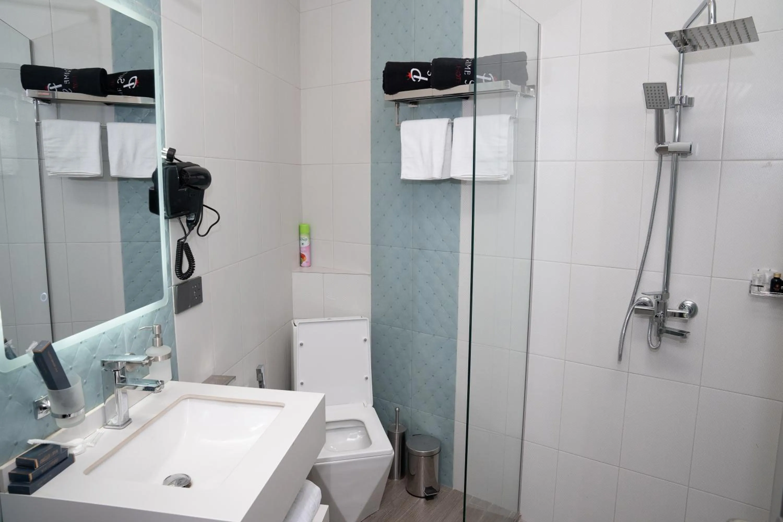 Shower in Prime Suites Hotel