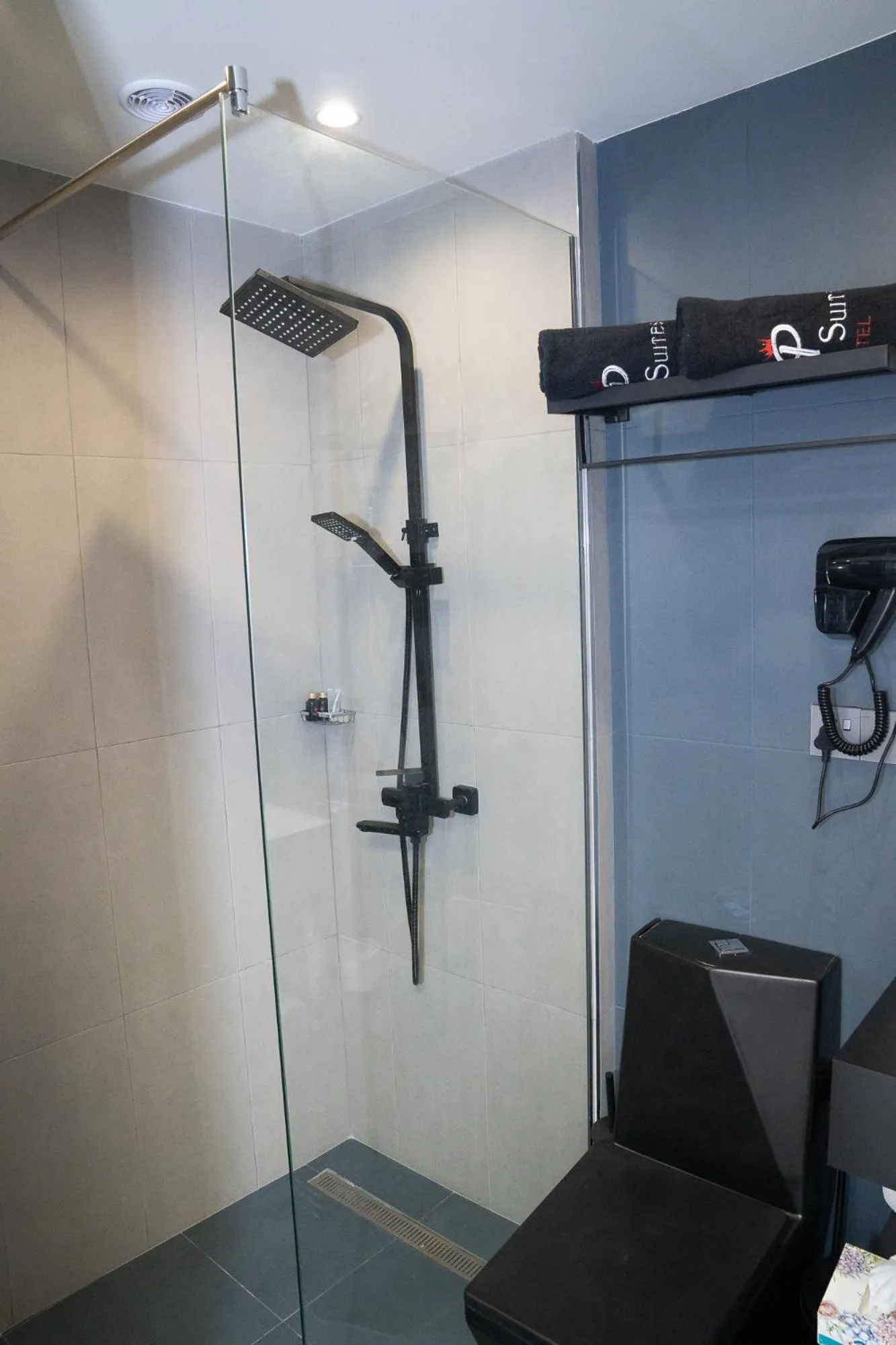 Shower in Prime Suites Hotel