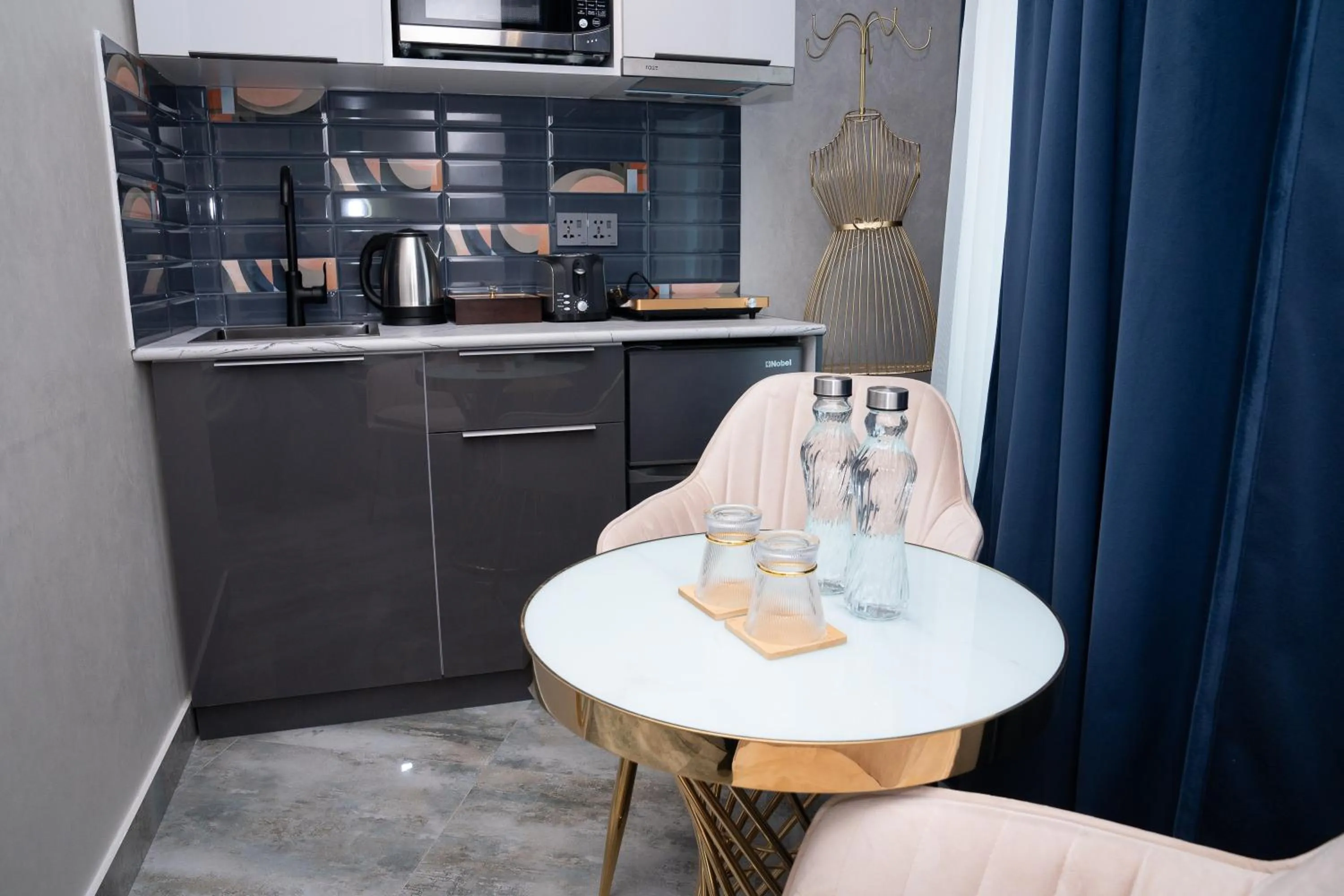 Kitchen or kitchenette in Prime Suites Hotel