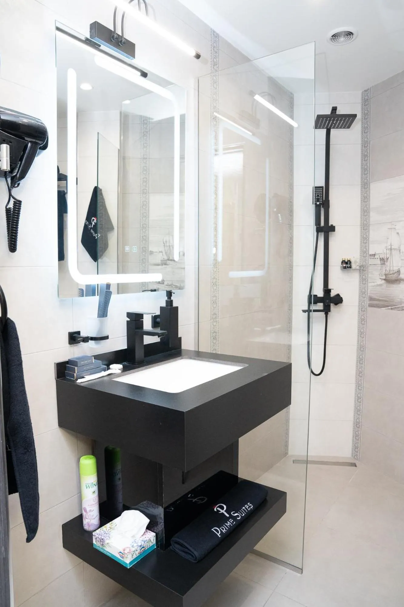 Shower in Prime Suites Hotel