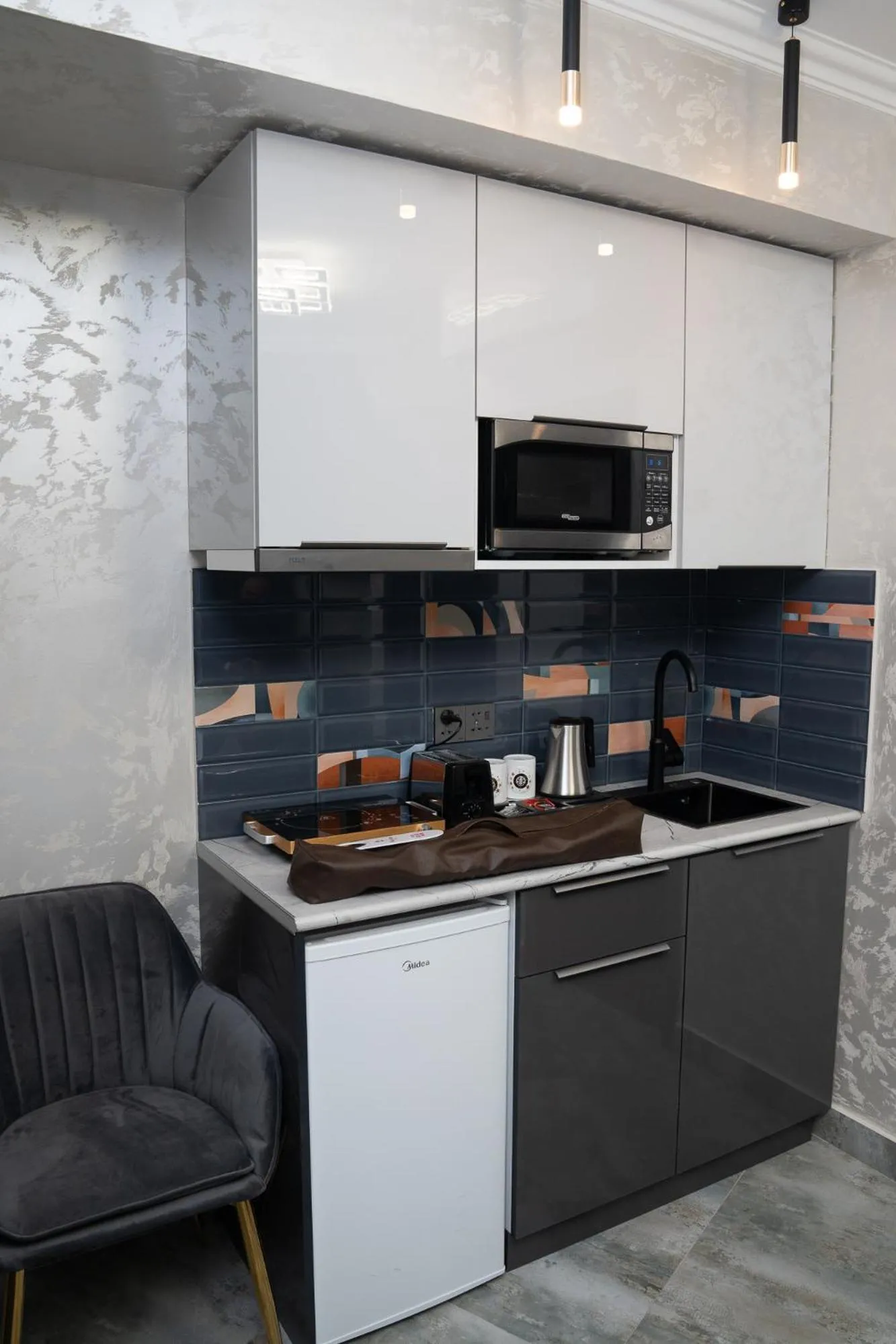 Kitchen or kitchenette in Prime Suites Hotel