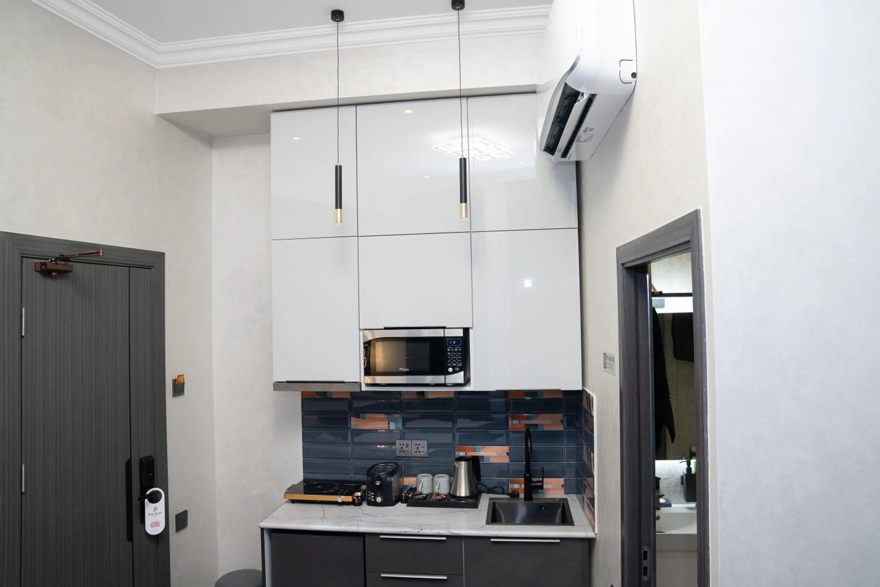 Kitchen or kitchenette in Prime Suites Hotel