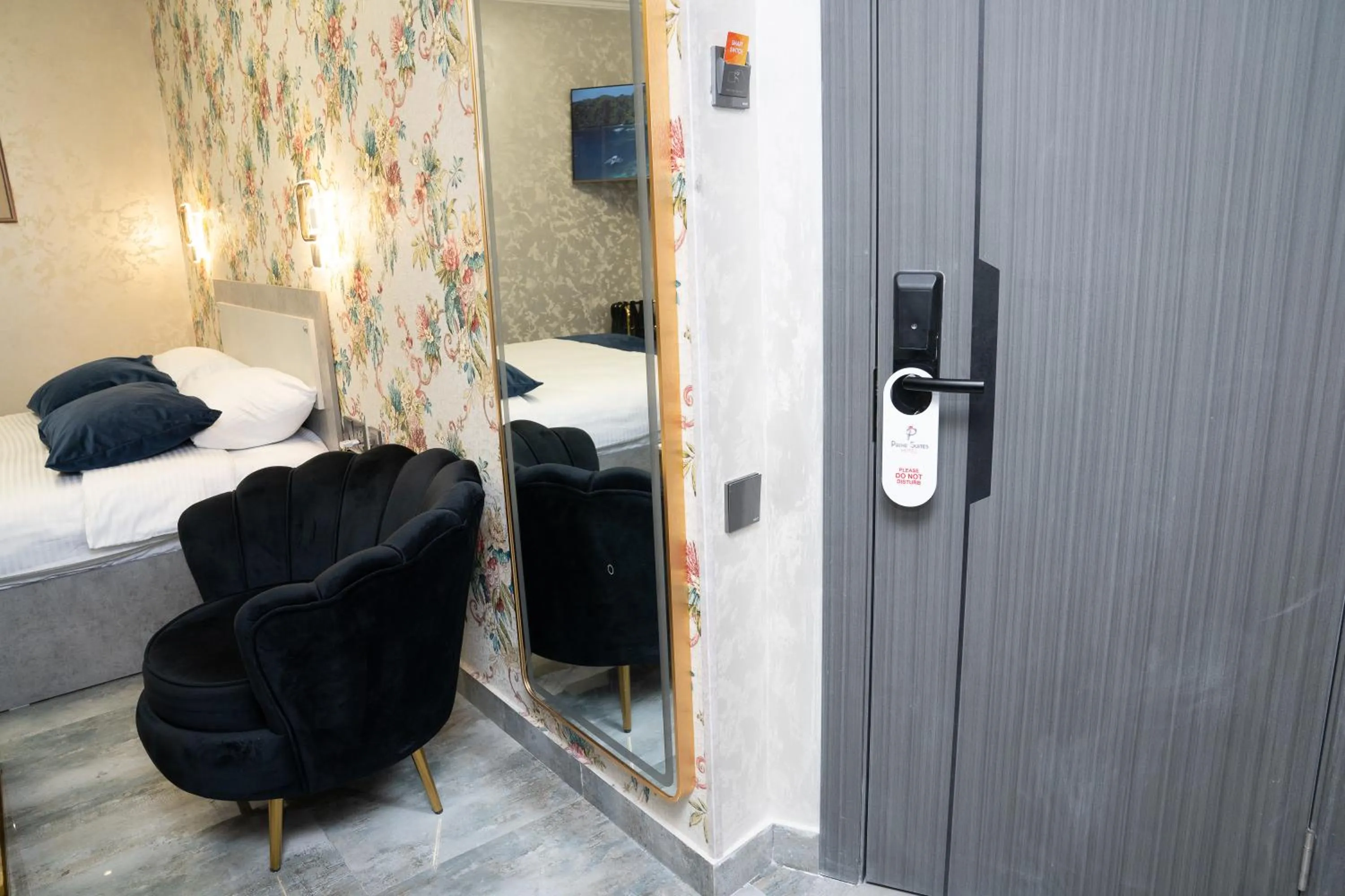 Photo of the whole room, Bed in Prime Suites Hotel