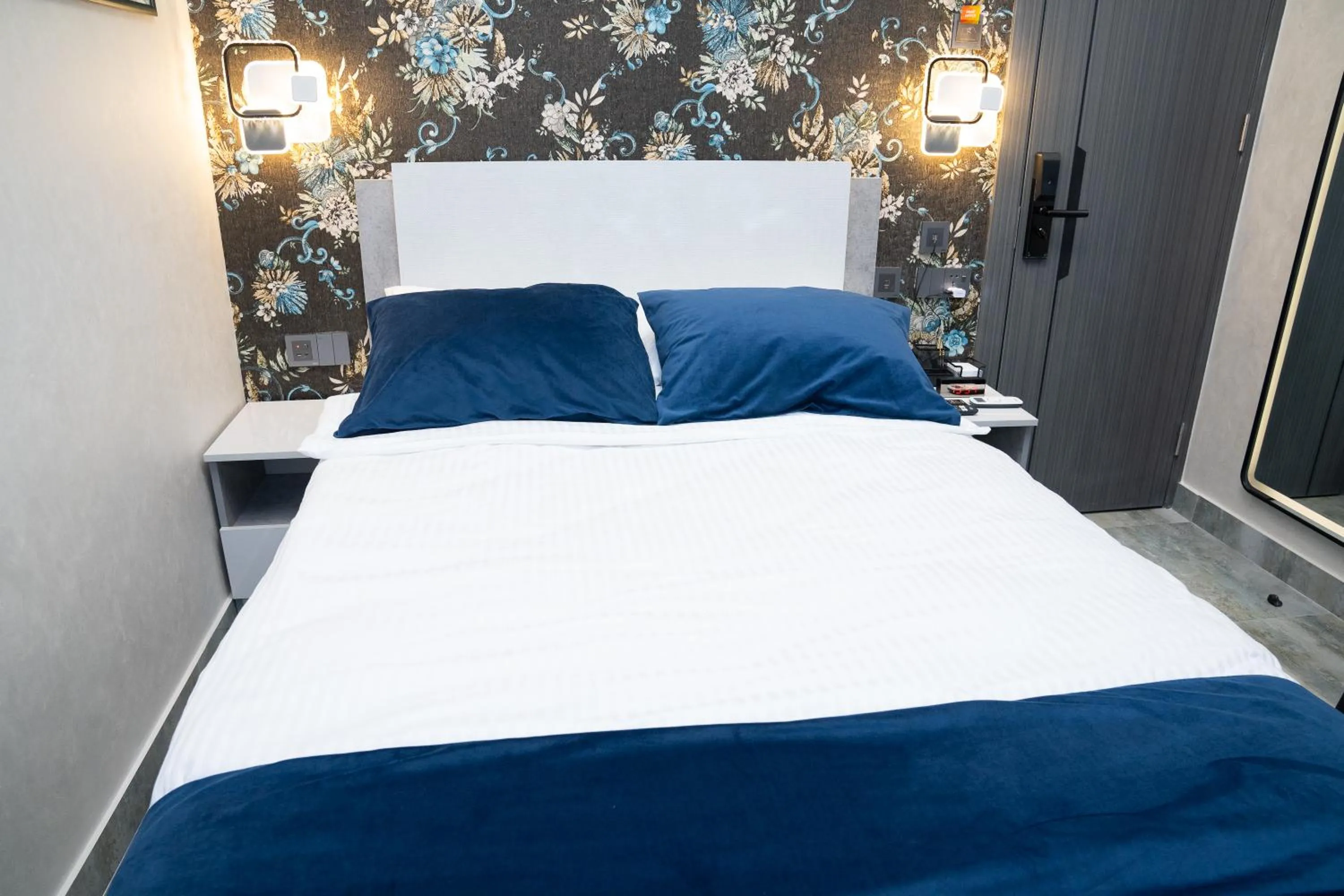 Bed in Prime Suites Hotel