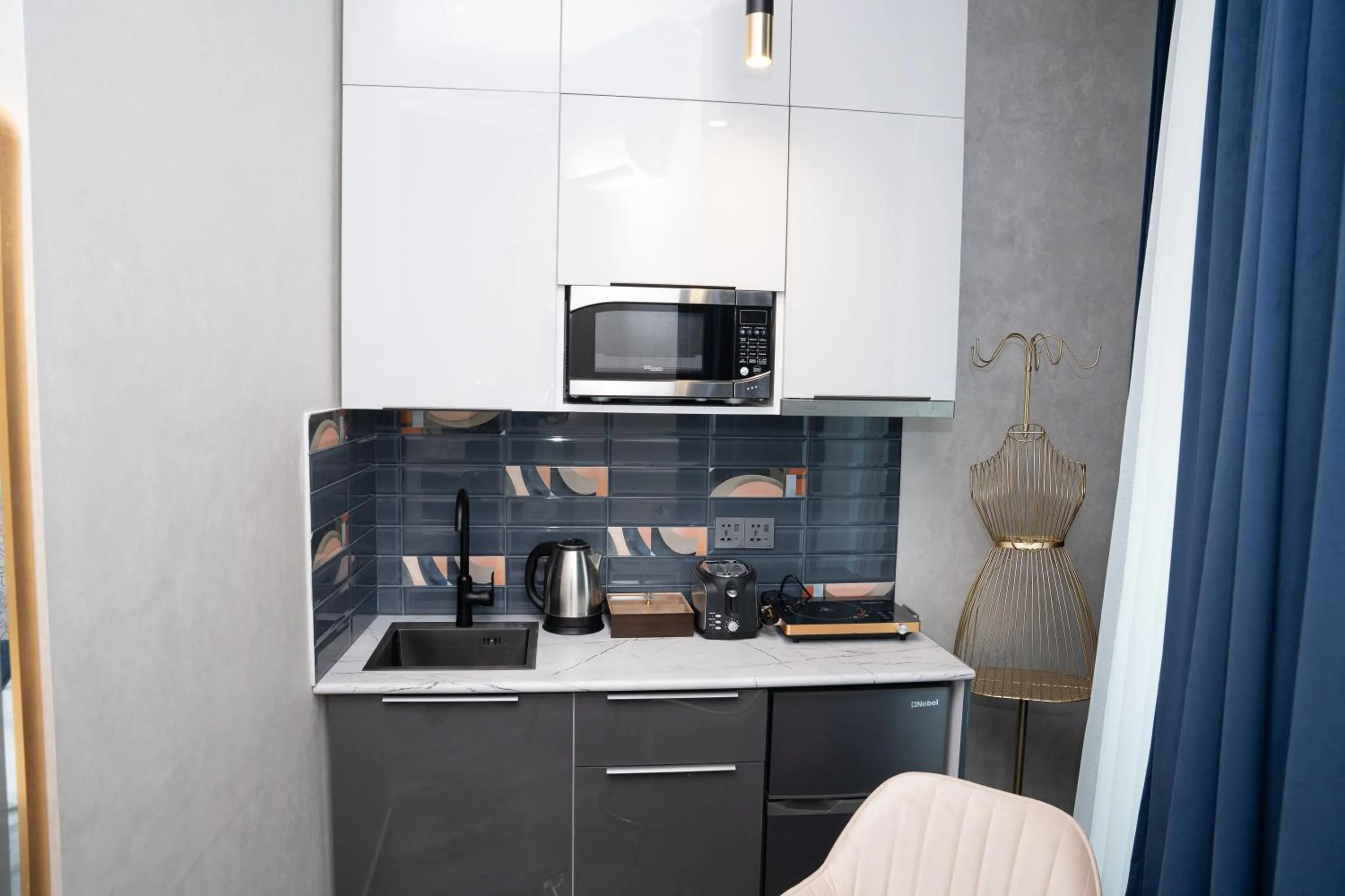 Coffee/tea facilities in Prime Suites Hotel