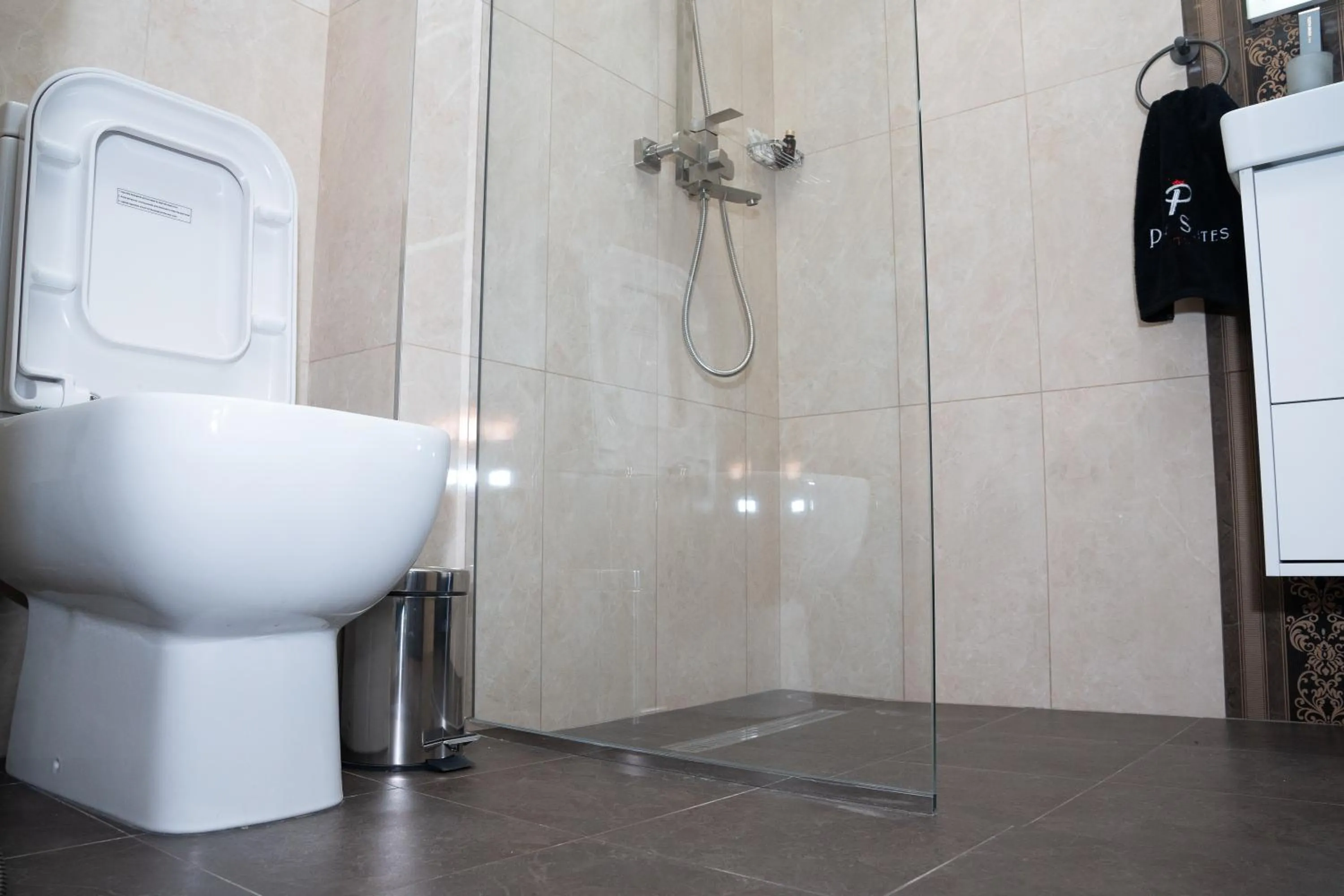 Shower in Prime Suites Hotel