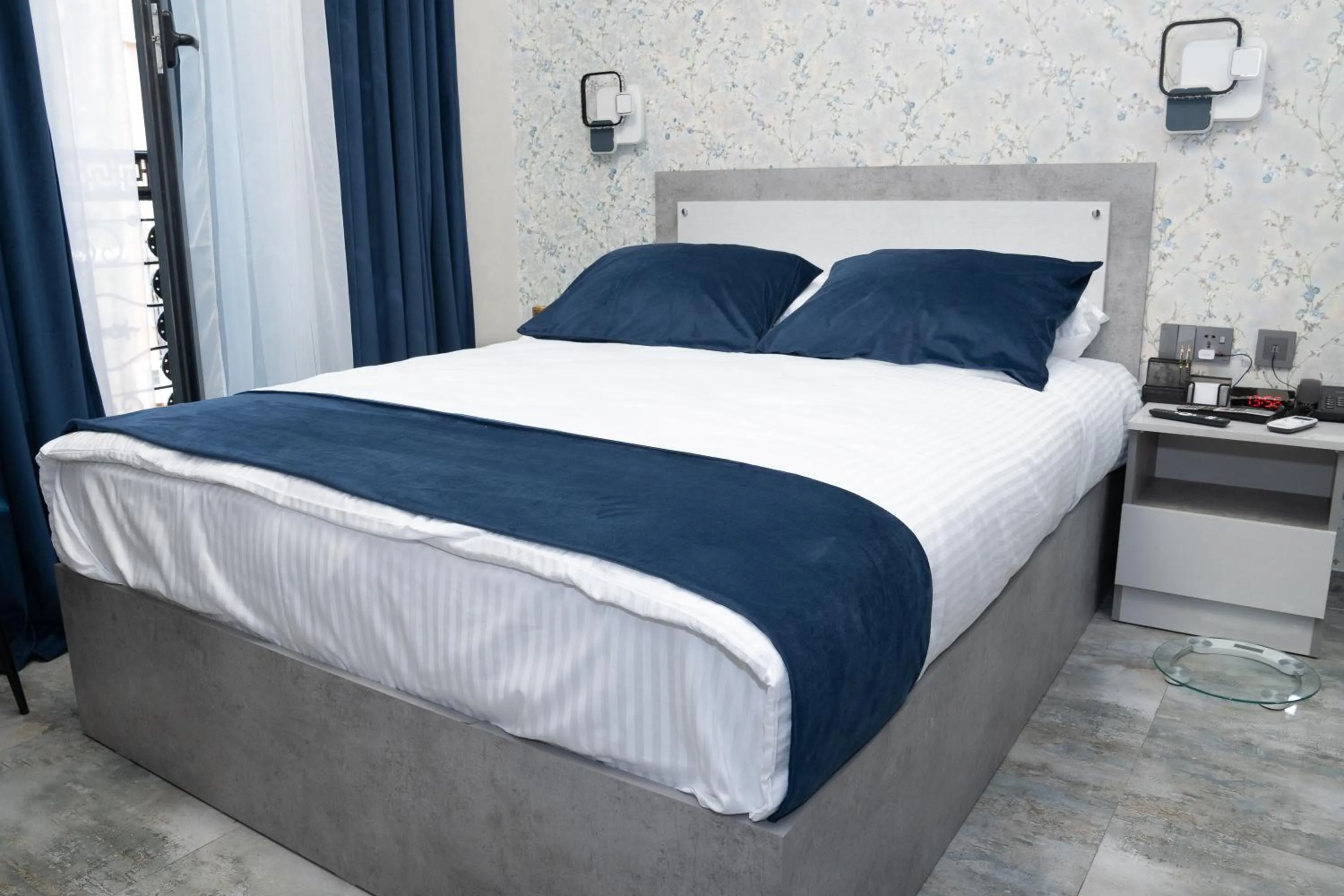 Bed in Prime Suites Hotel