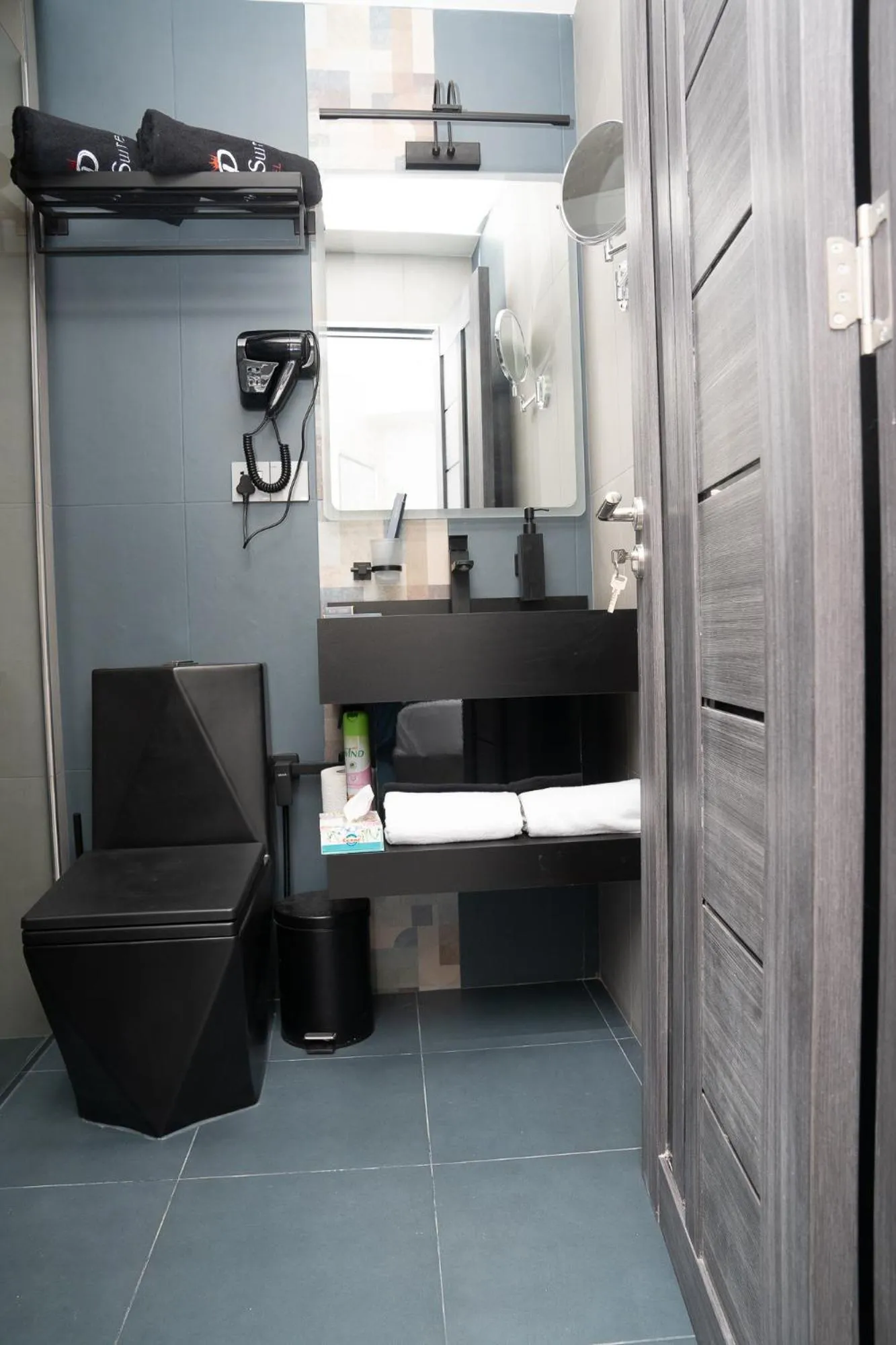 Toilet in Prime Suites Hotel