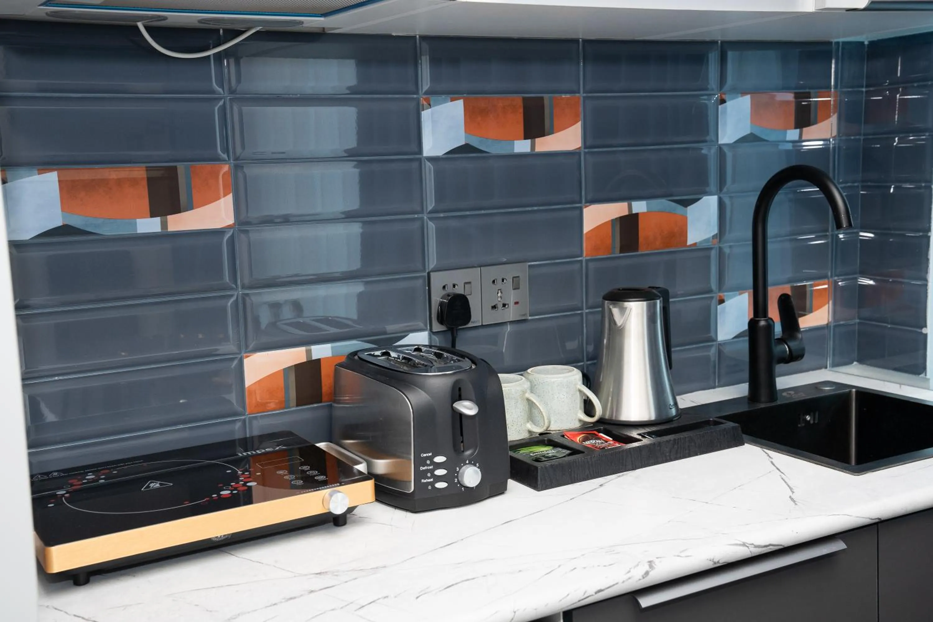 Coffee/tea facilities in Prime Suites Hotel