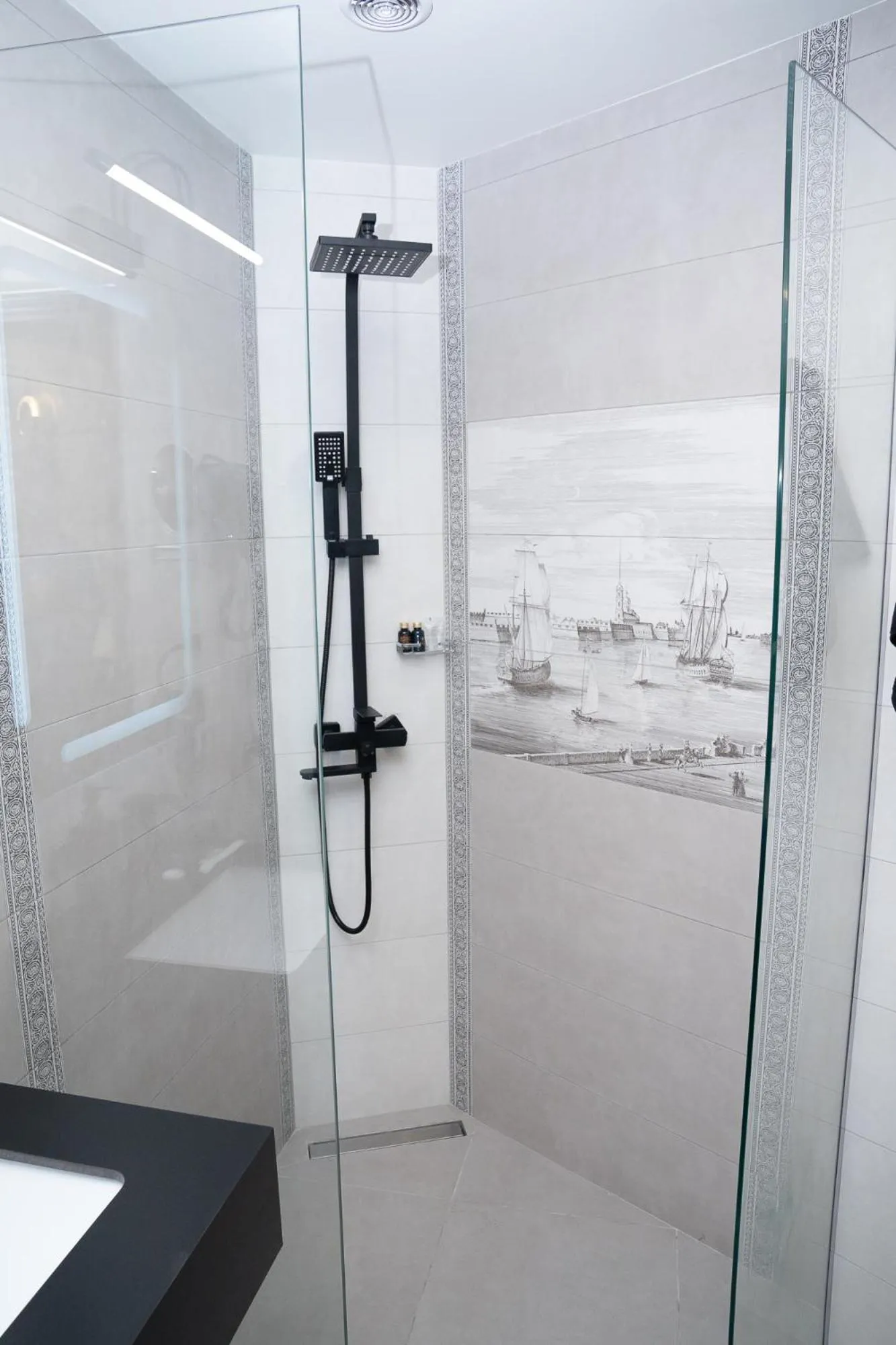 Shower in Prime Suites Hotel