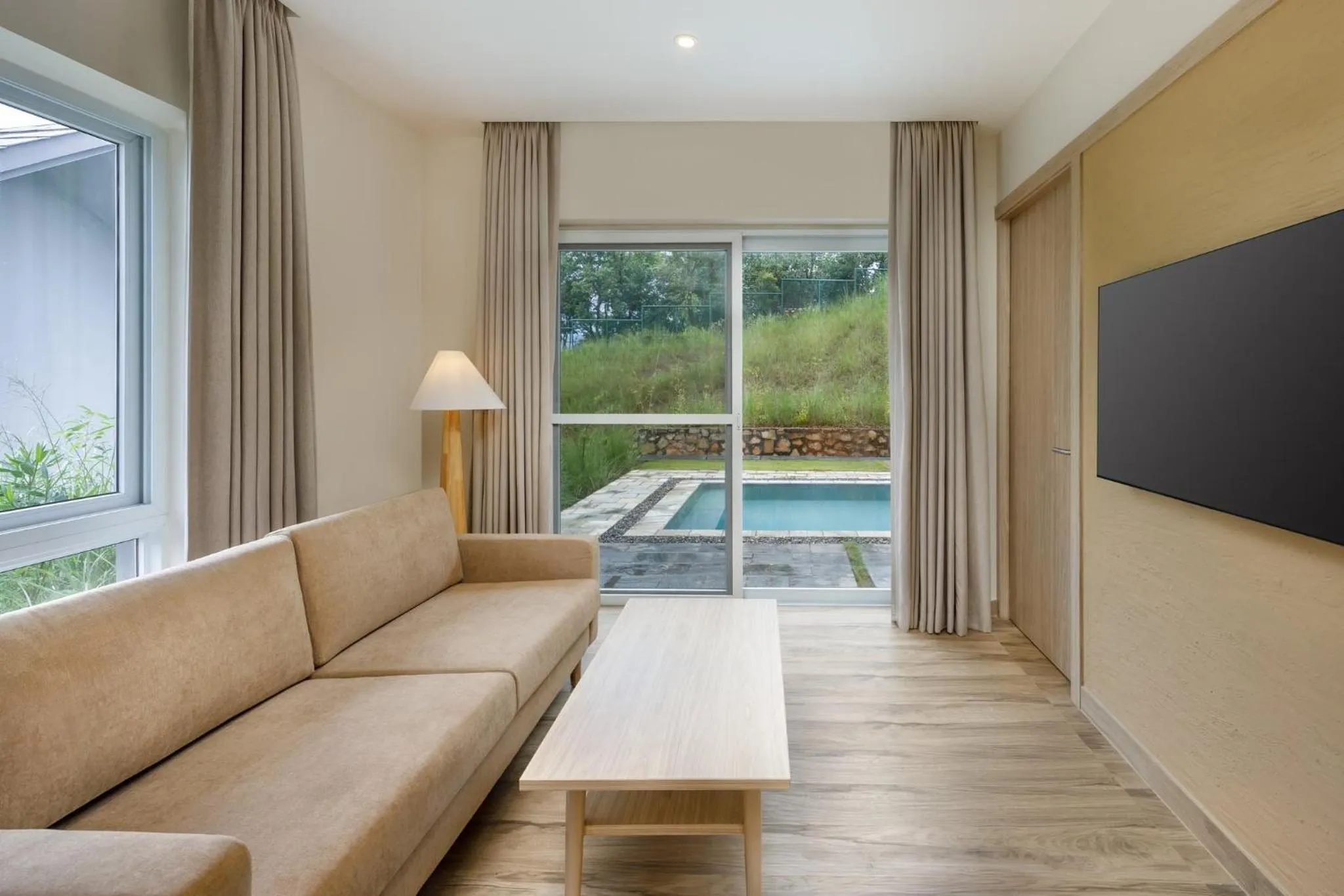 Photo of the whole room in Himalayan Hideaway Resort Pokhara, The Centara Collection