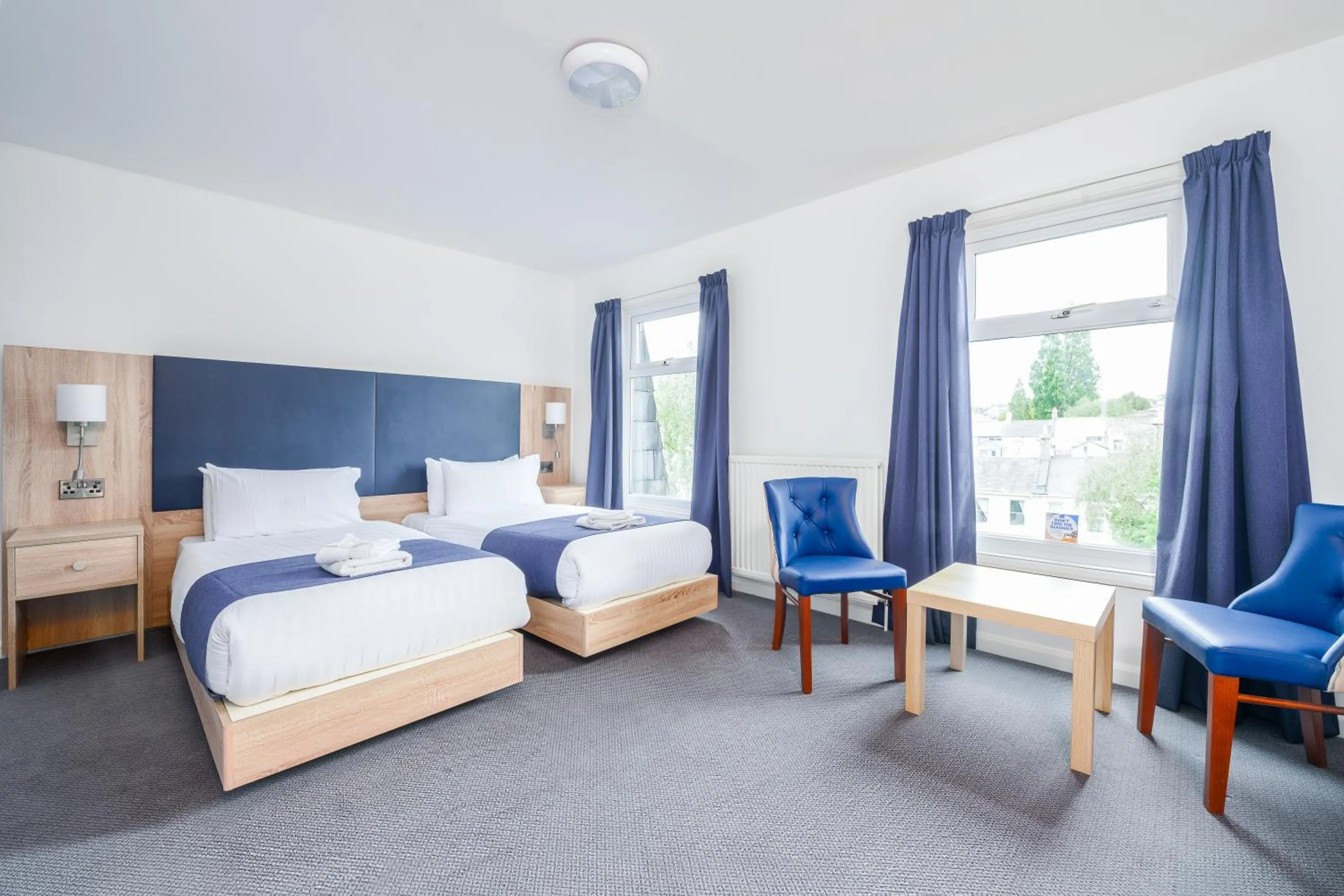 Bed in Abbey Lawn Hotel