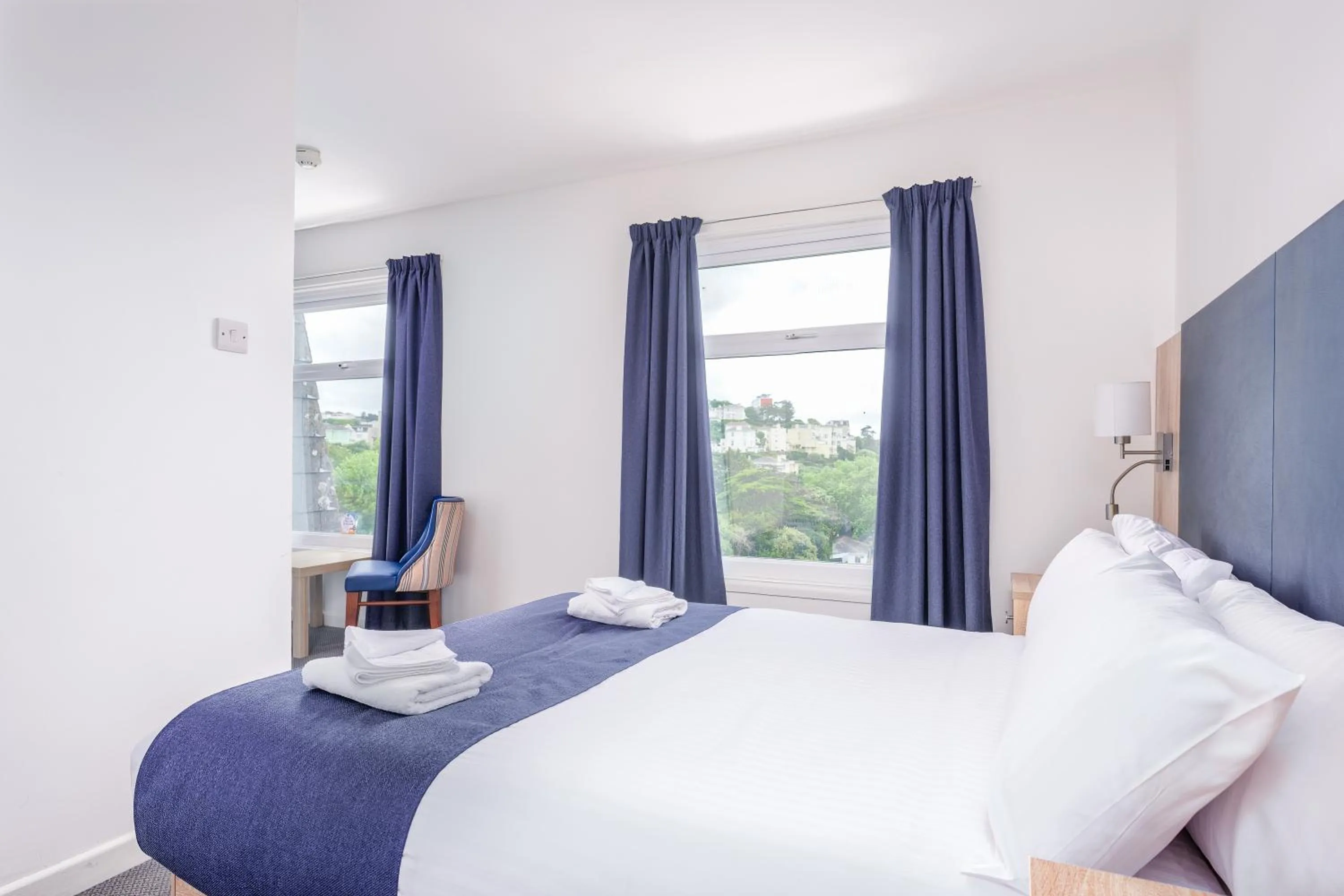 Bed in Abbey Lawn Hotel