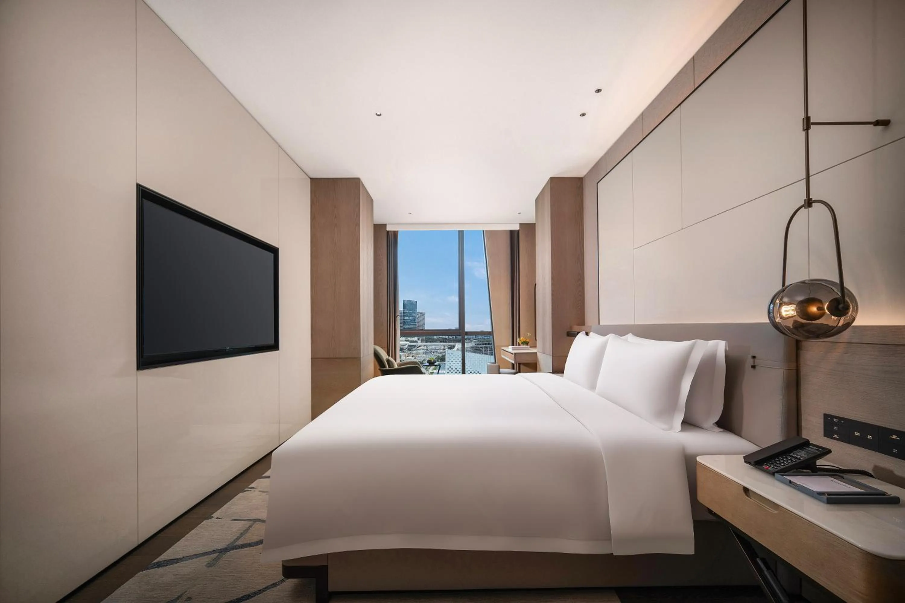 Bedroom in Wyndham Grand Shenzhen Guangming