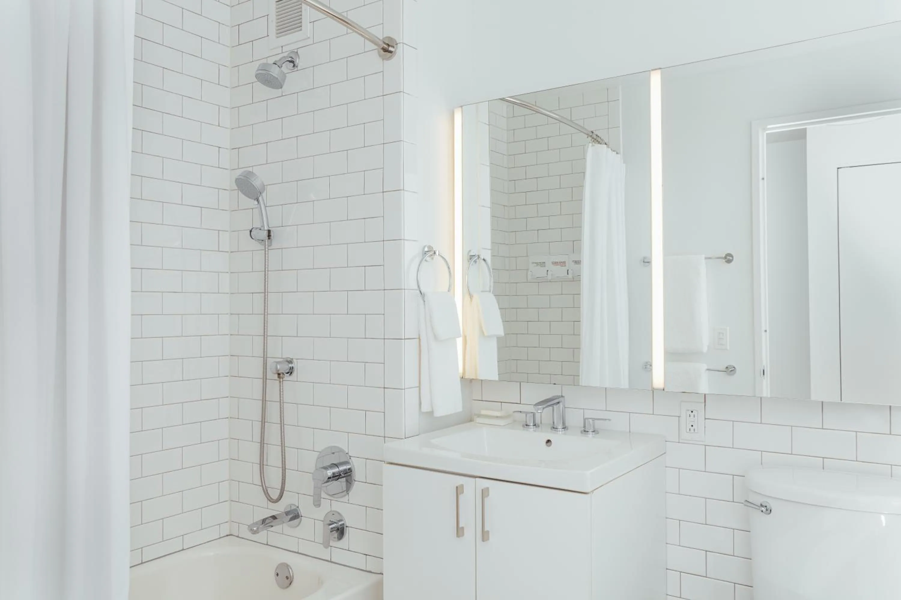 Bathroom in Mint House 70 Pine by Kasa