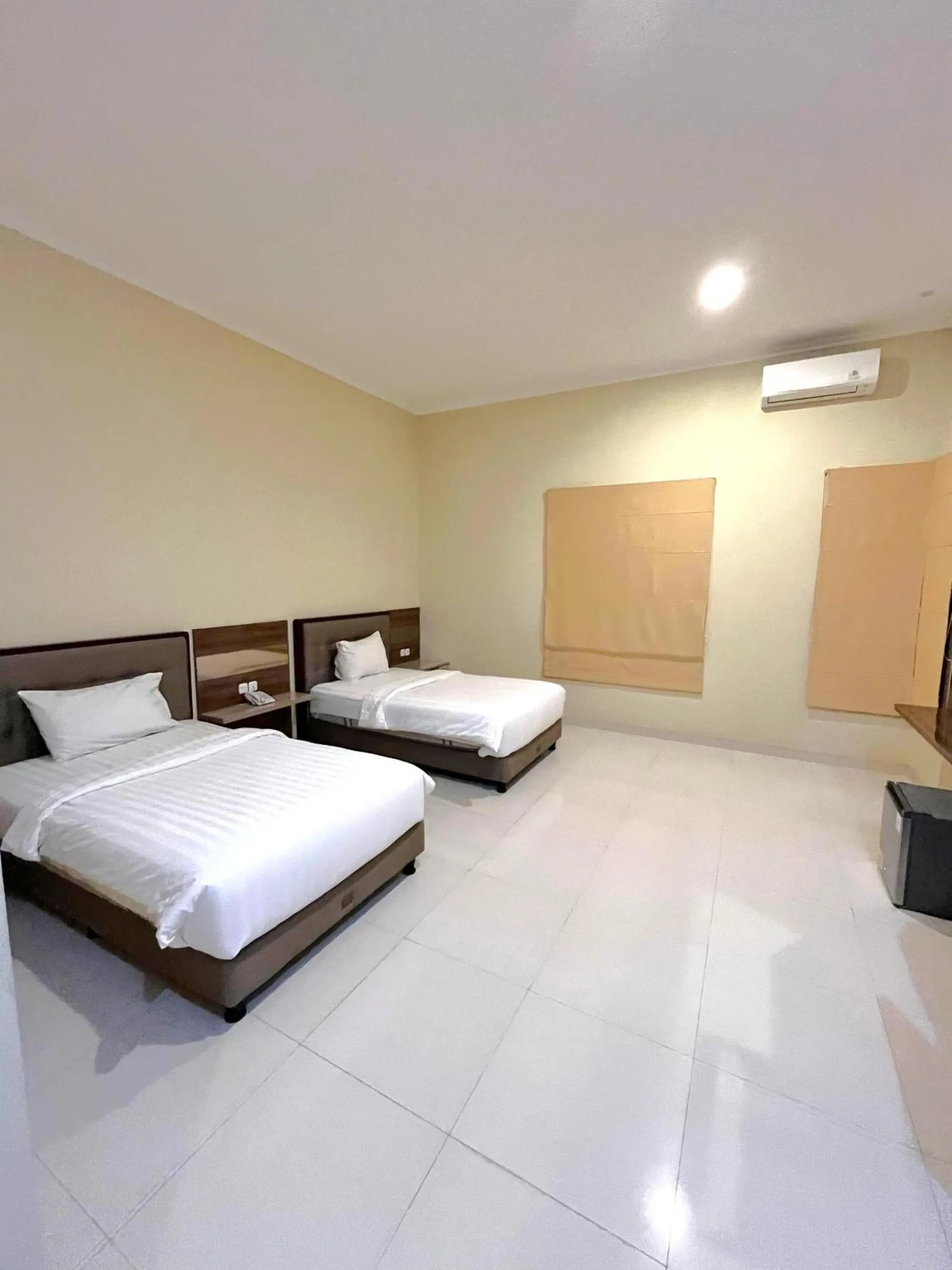Bed in Alloro Boutique Hotel Pacitan